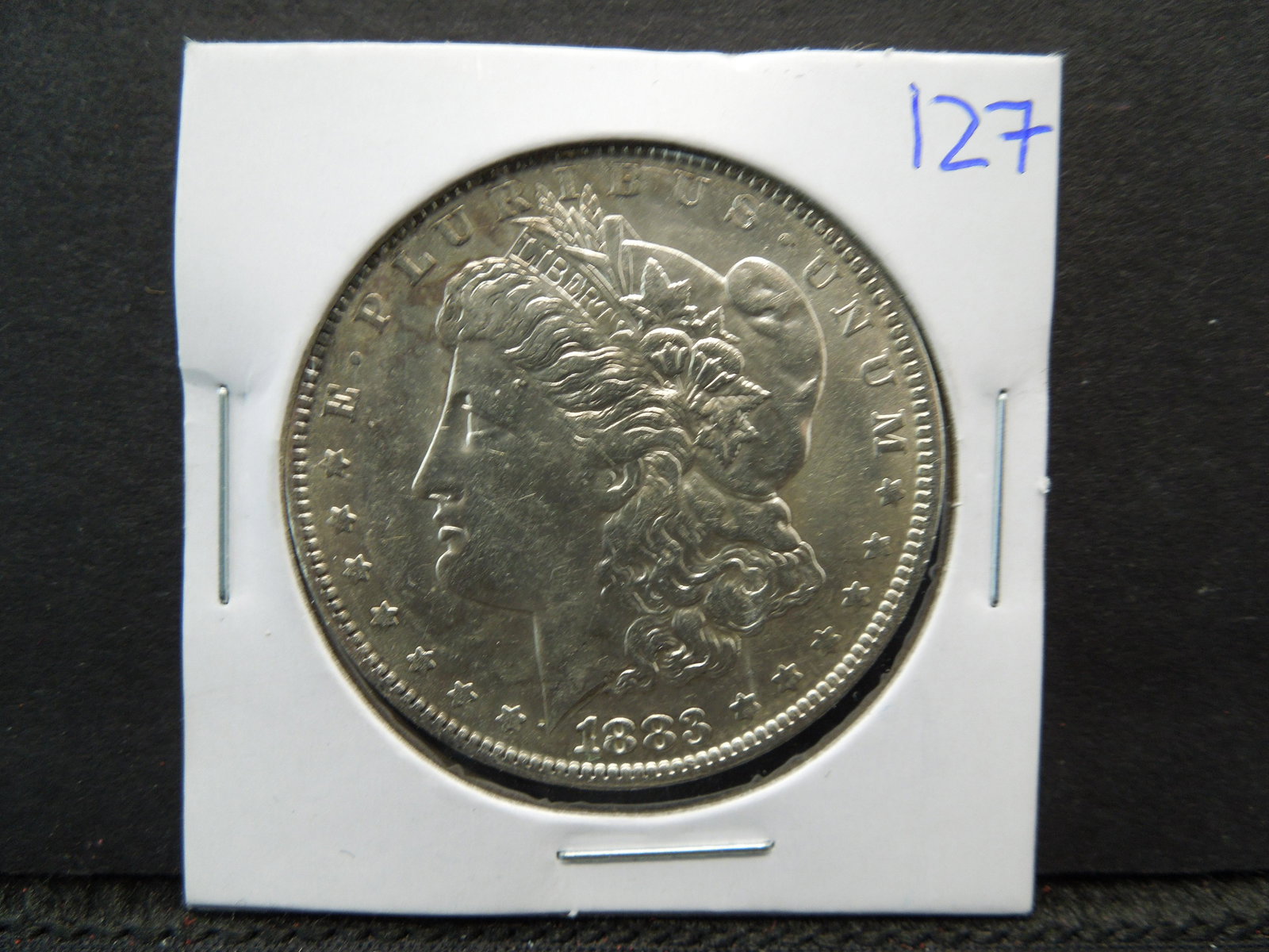 Beautiful uncirculated 1883-o Morgan silver dollar (1 of 3)