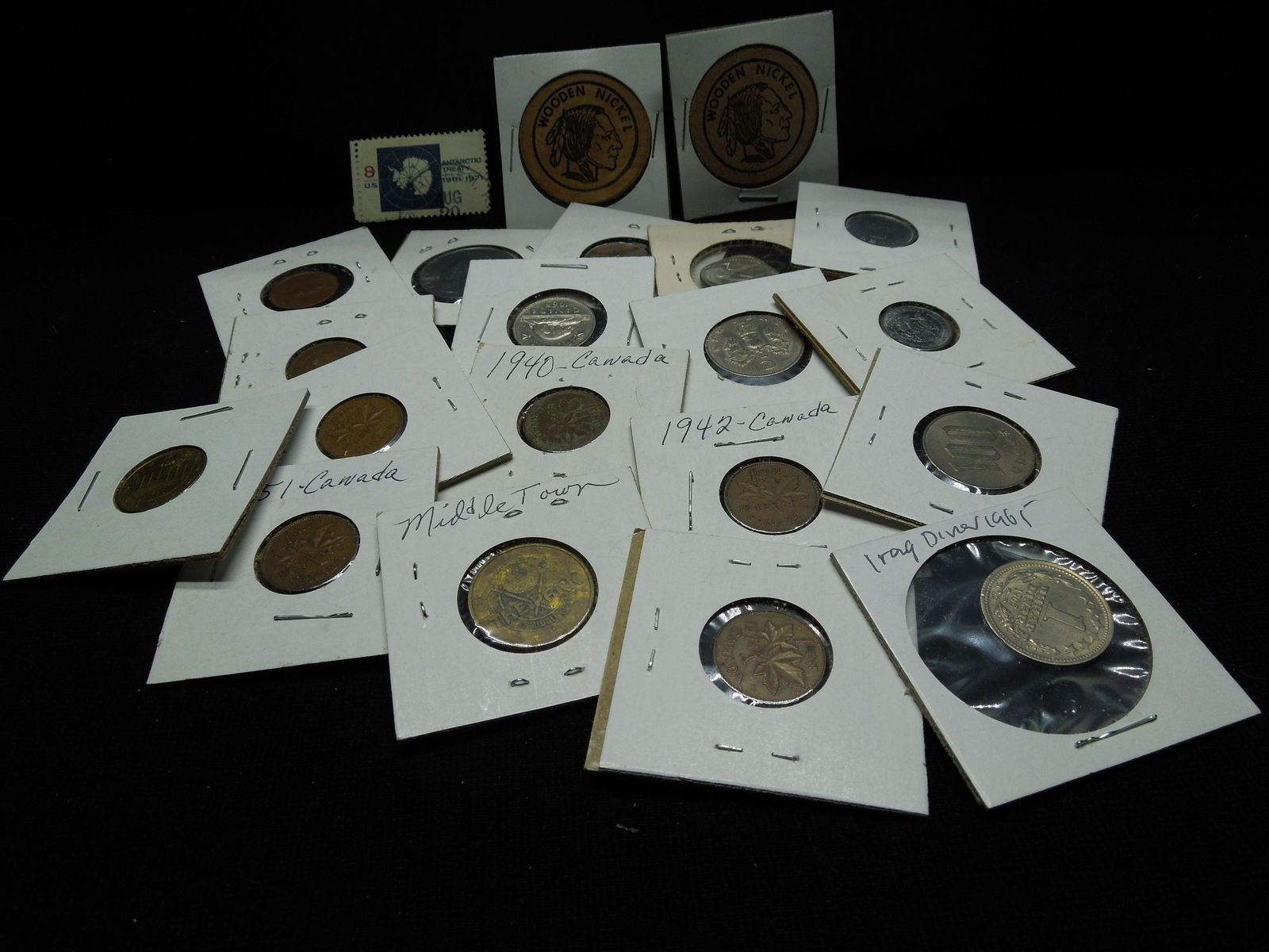 bag of foreign coins and a wooden nickel (1 of 6)