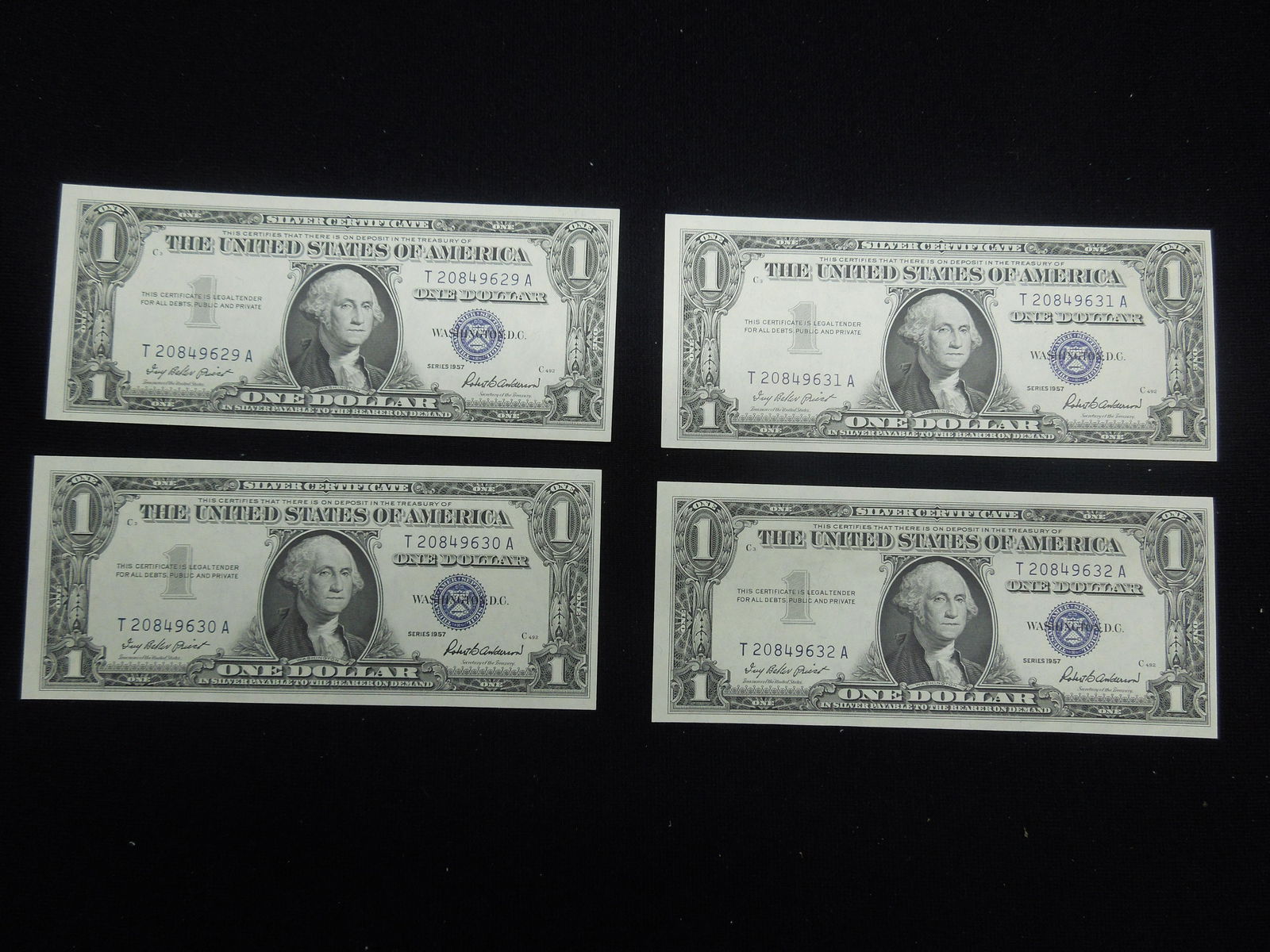 (4) 1957 $1 Silver Certificates.  Consecutive Serial (1 of 5)