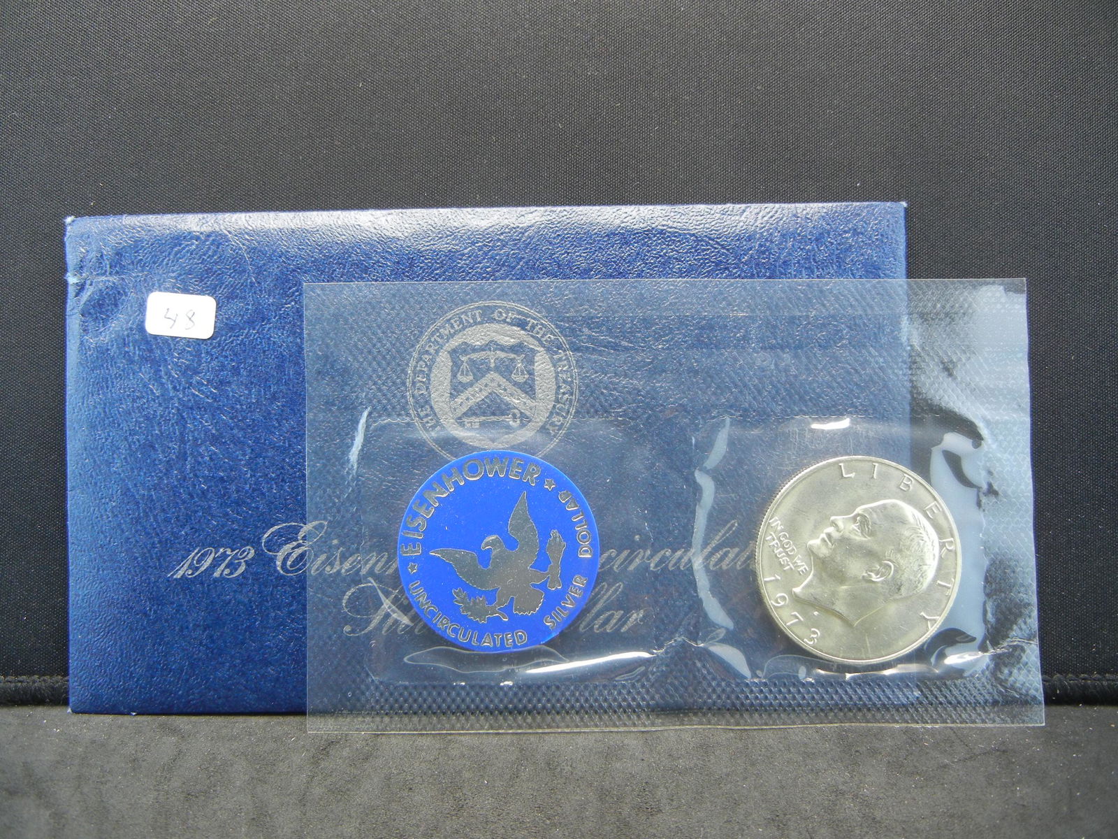 1973-S Eisenhower Silver dollar in blue pack.  GEM. (1 of 3)