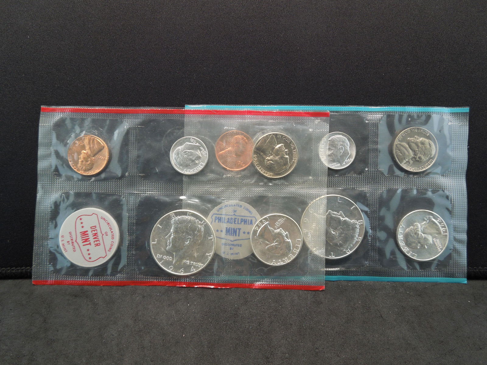 1964 P/D US Silver Mint set in government holder.  GEM. (1 of 5)