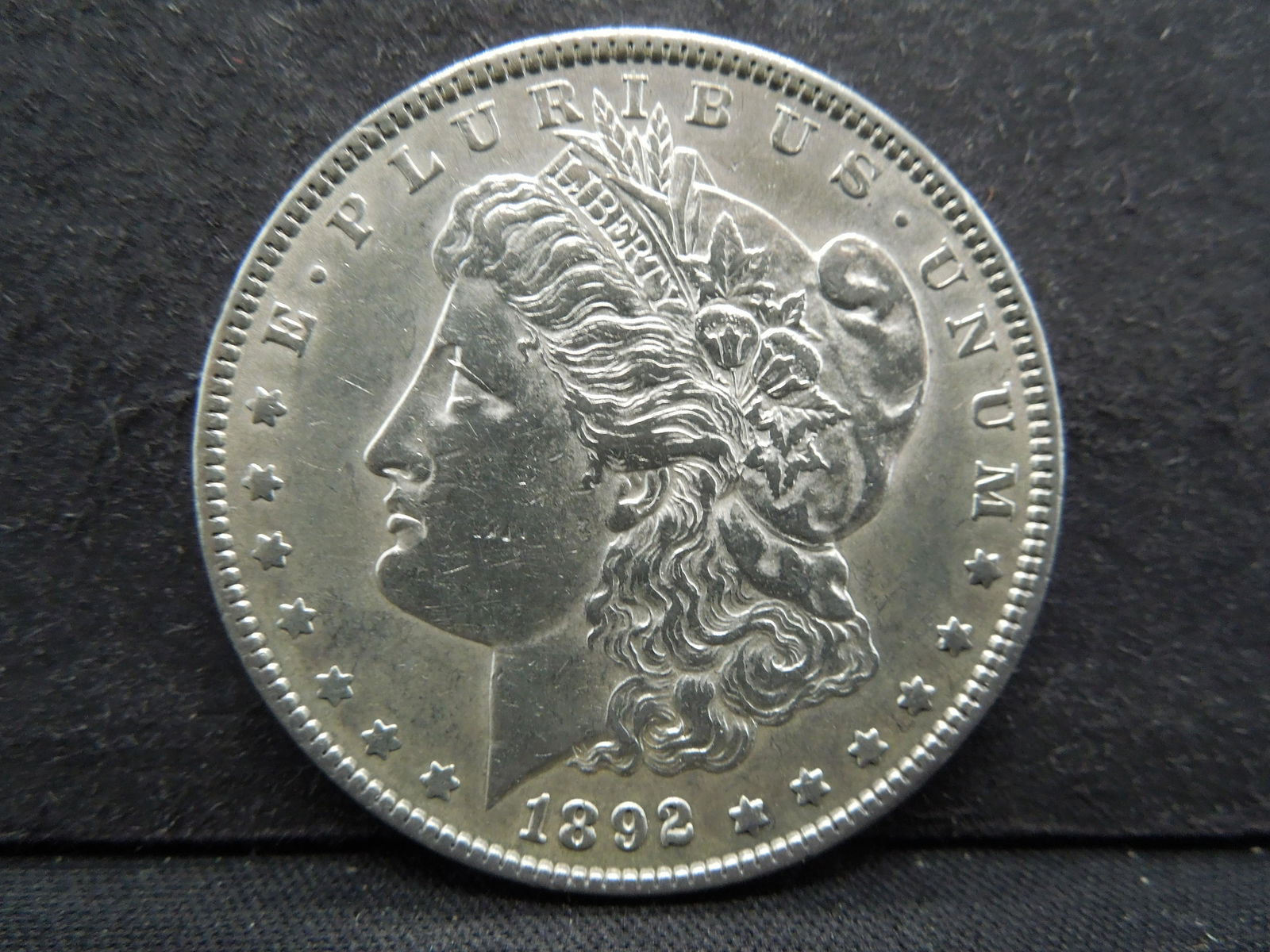 1892 Morgan $1.  AU/UNC.  Better Date. (1 of 2)