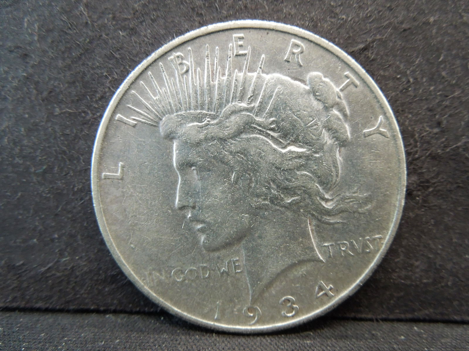 1934-D Semi-Key Date Peace Silver Dollar. (1 of 2)
