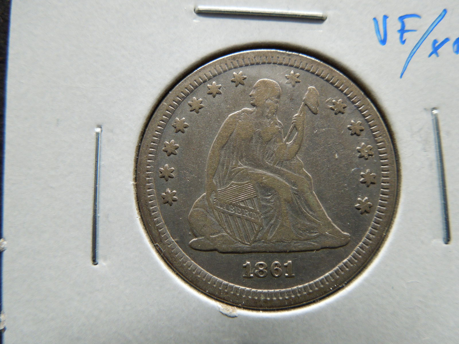 1861 Seated 25c.  VF/XF. (1 of 3)
