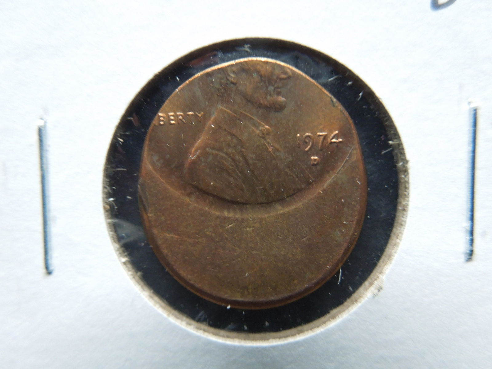 (Mint Error) 1974-D Off-Centered Lincoln Cent (1 of 3)