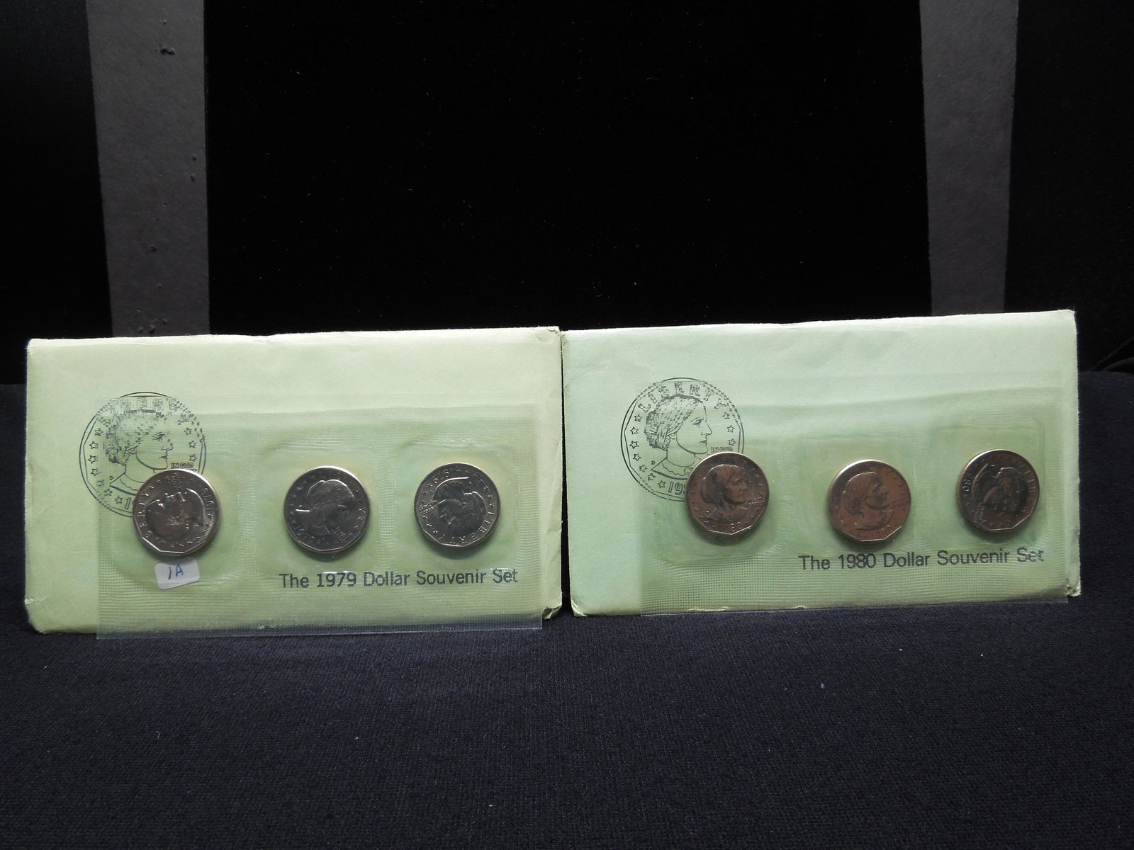 (2) Susan B. Anthony US Mint Souvenir Sets:  1979 and (1 of 5)