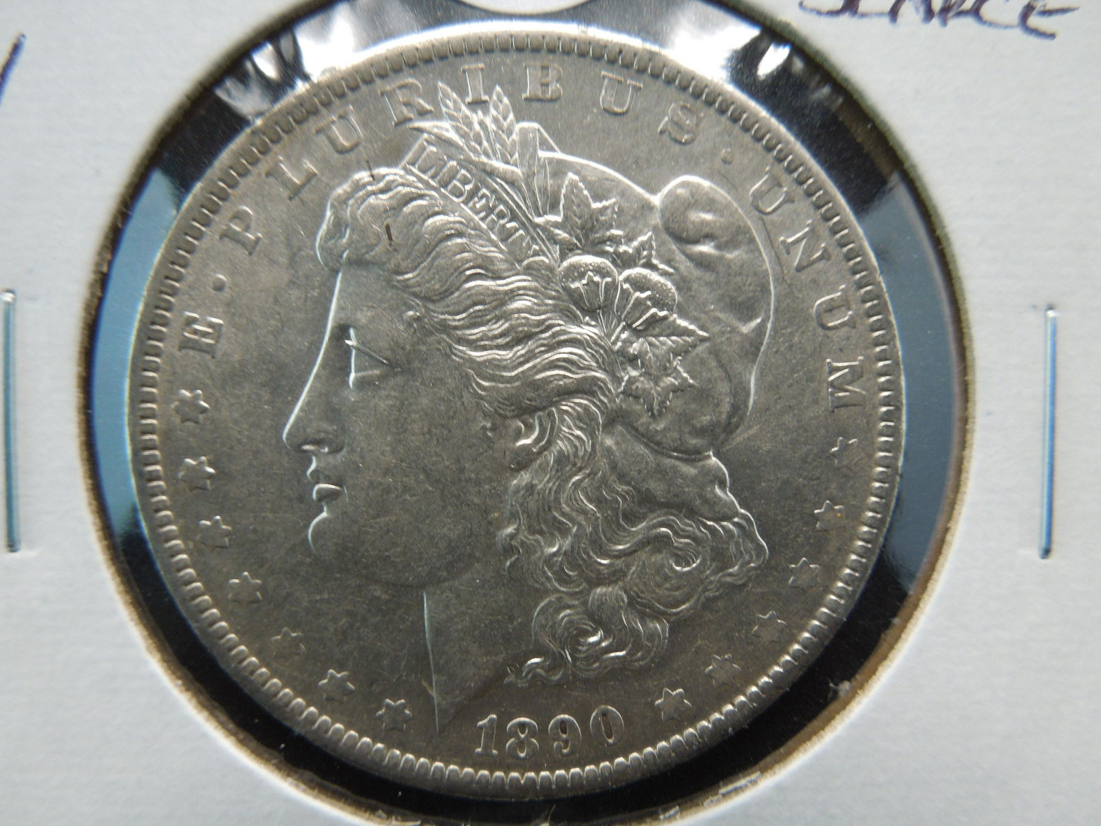 1890-O Morgan $1.  AU/UNC.  Scarce. (1 of 3)