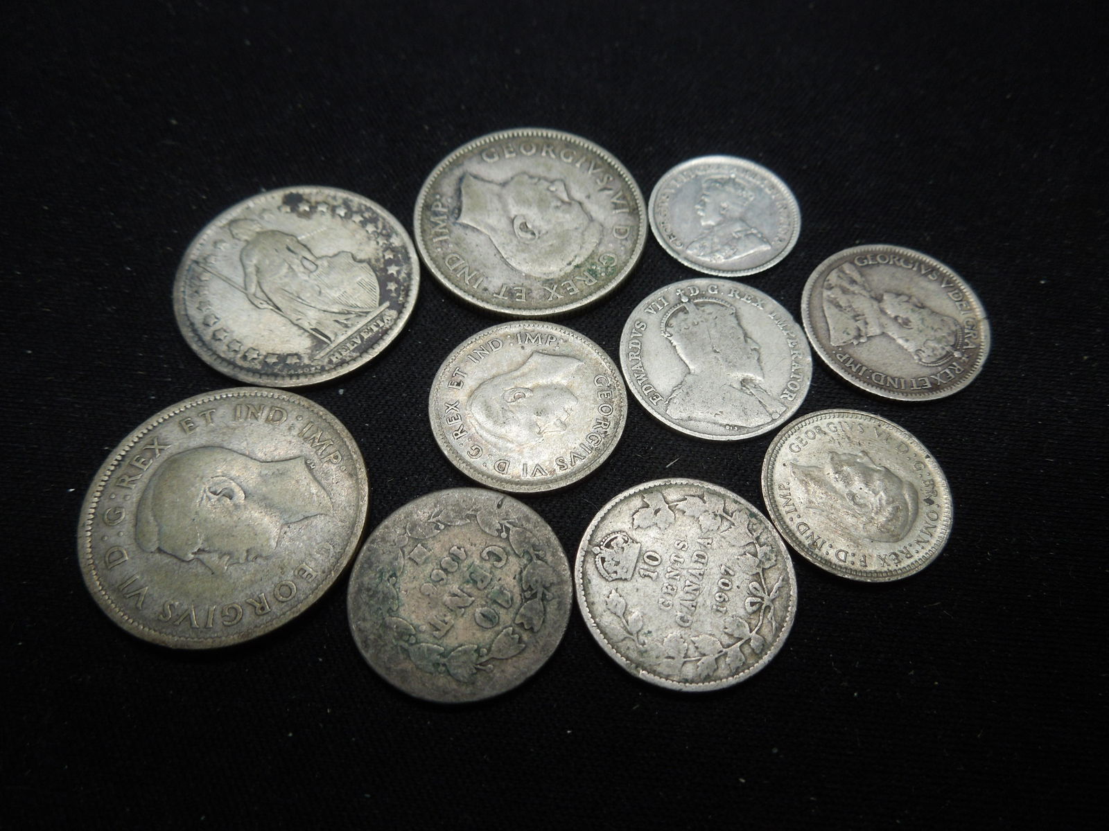10 Silver Foreign Coins. (1 of 3)