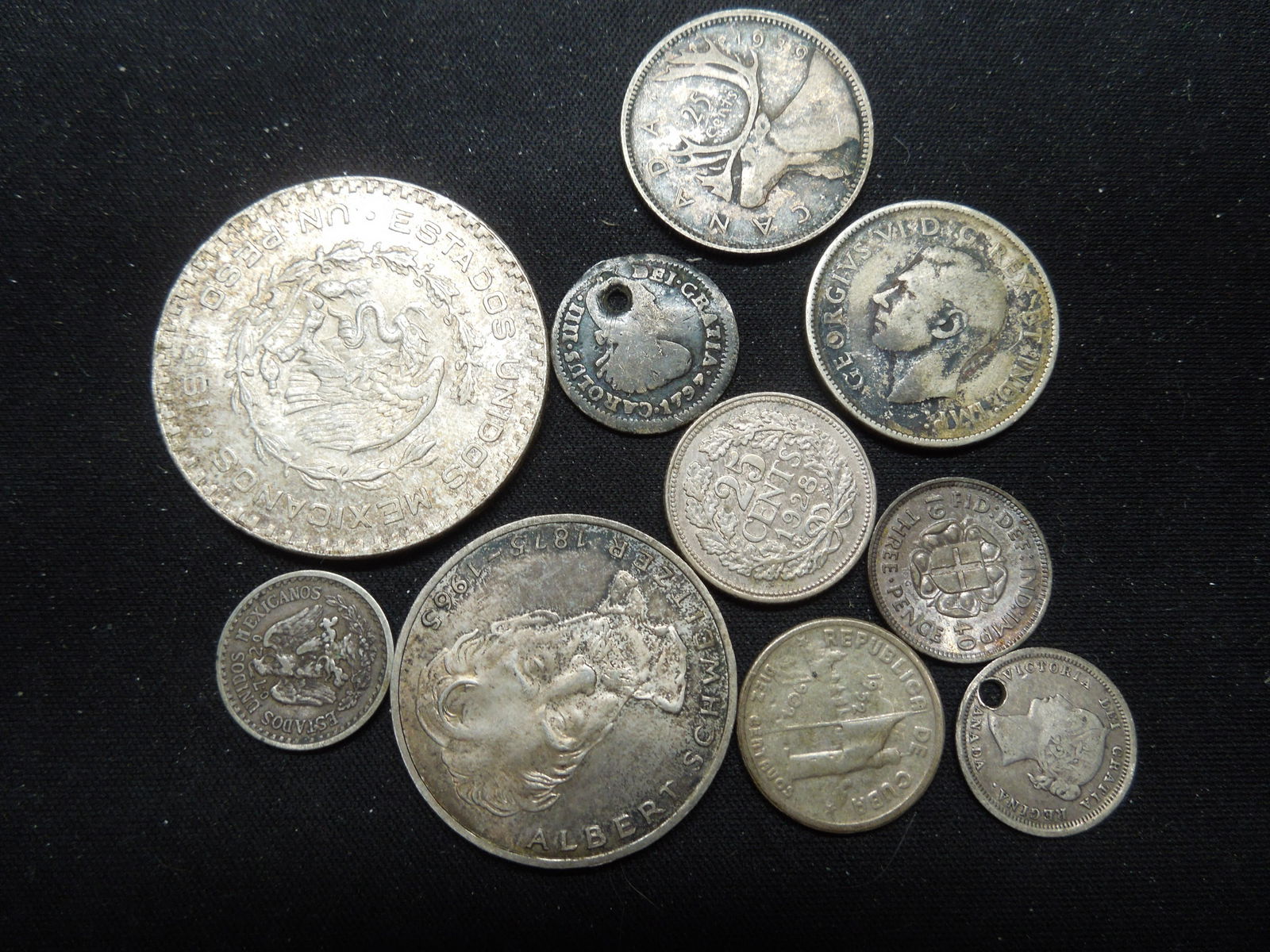 10 Silver Foreign Coins. (1 of 3)