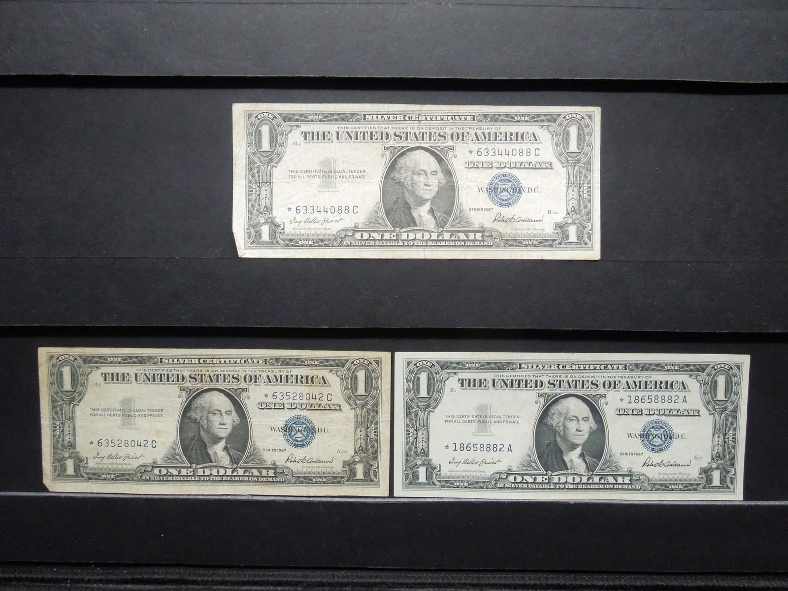 3 - 1957 $1 Silver Certificate Star Replacement Notes. (1 of 4)