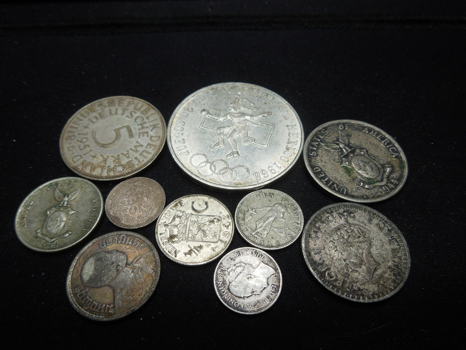 10 Silver Foreign Coins. (1 of 3)