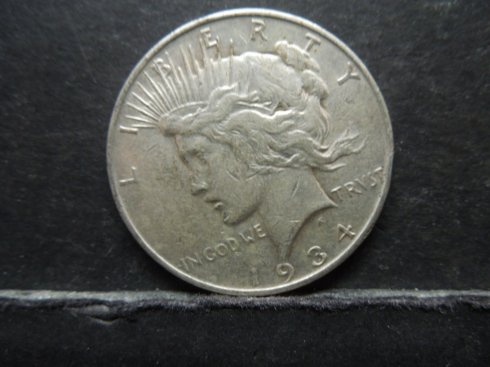 1934-D PEACE SILVER (90%) DOLLAR (1 of 2)