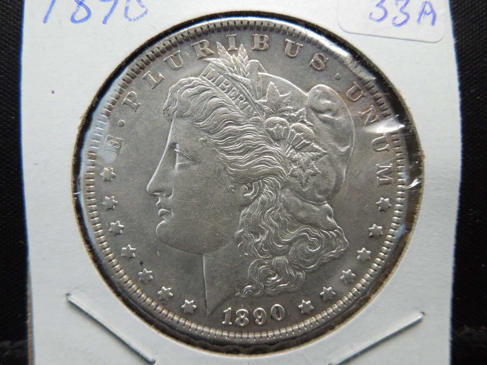 1890 Morgan Dollar.  BU.  Better date. (1 of 3)