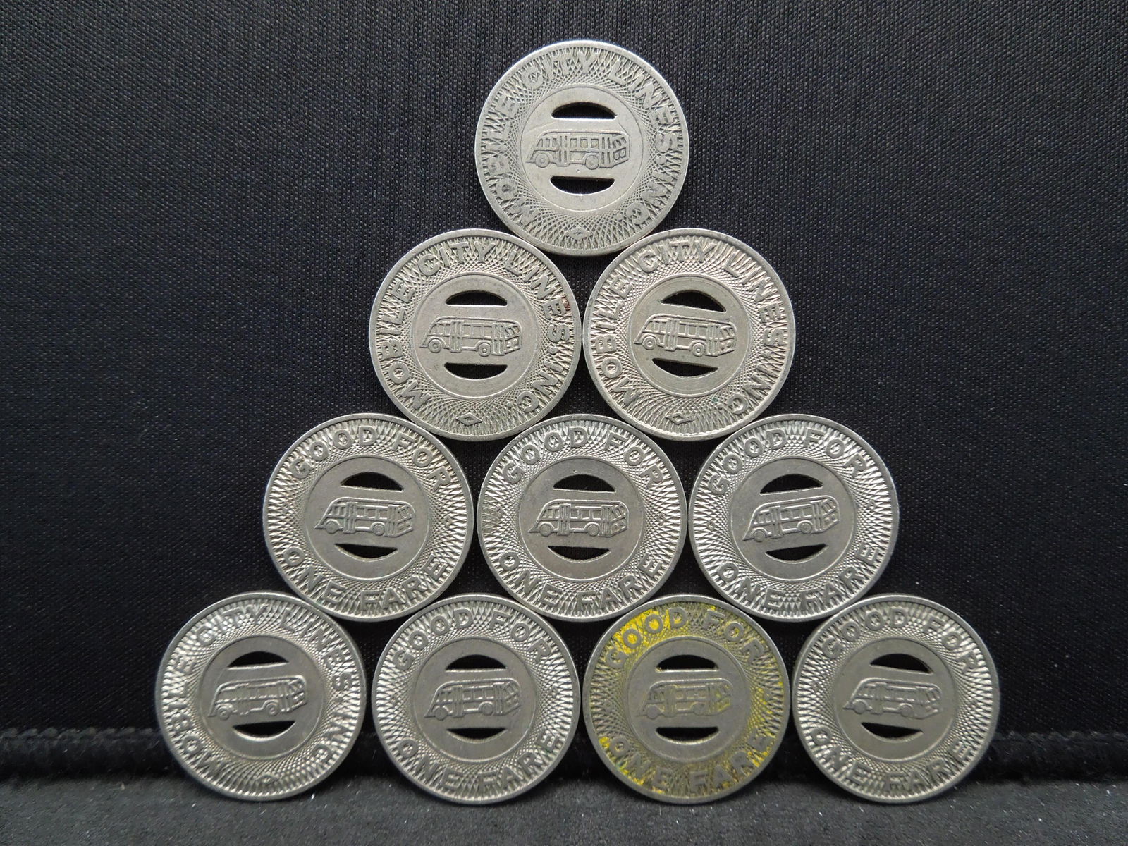 Group of 10 Transit Tokens. (1 of 2)