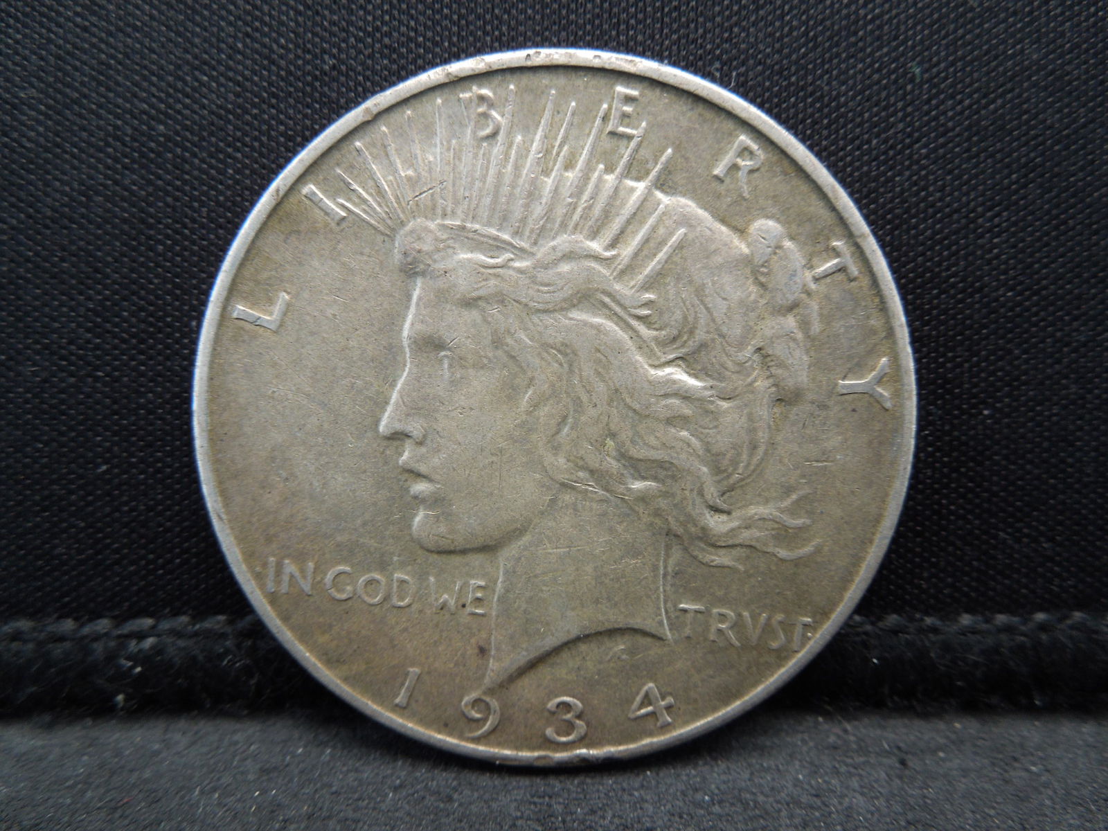 1934-D Semi-Key Date Peace Silver Dollar. (1 of 2)