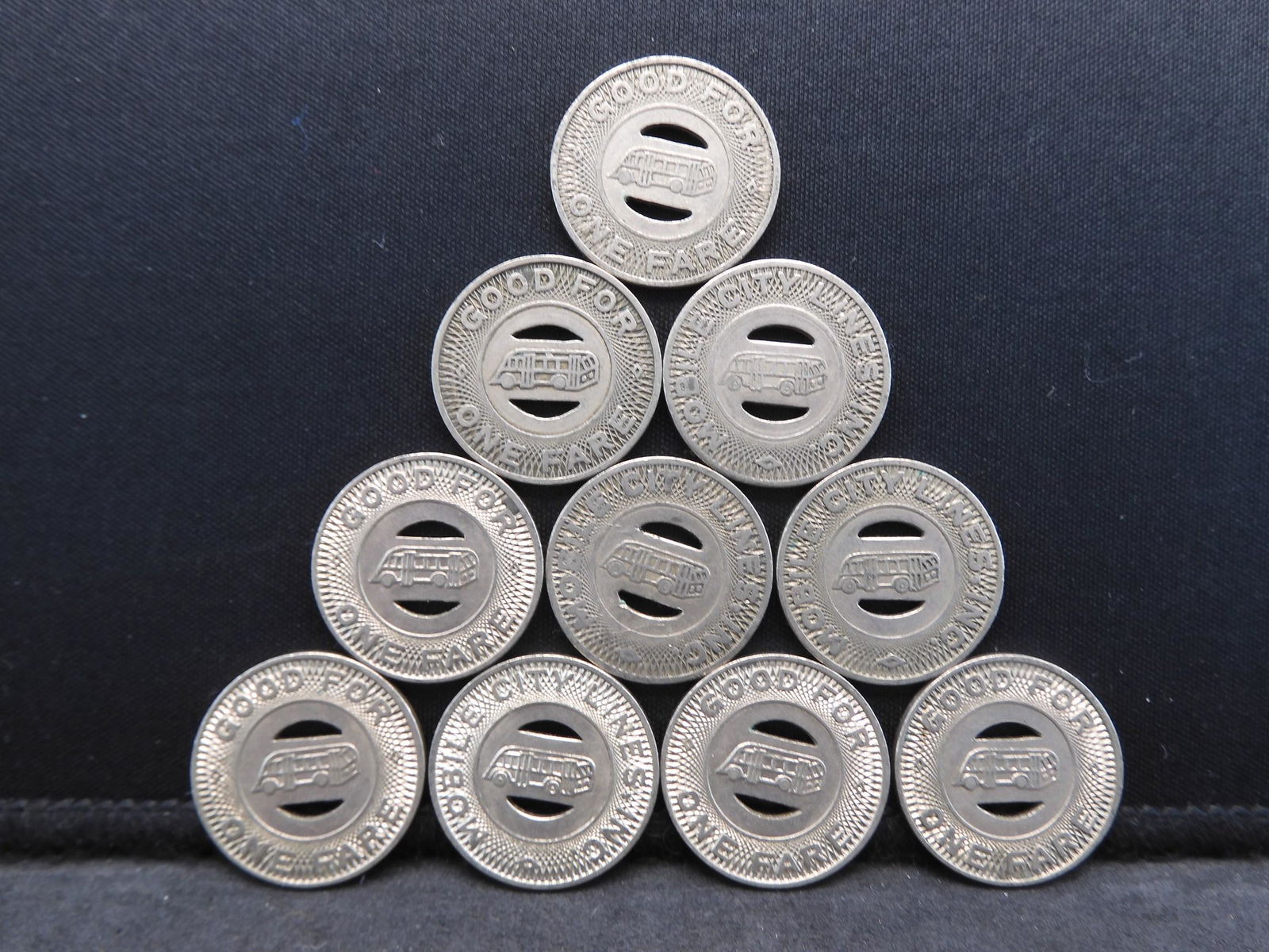 Group of 10 Transit Tokens. (1 of 2)