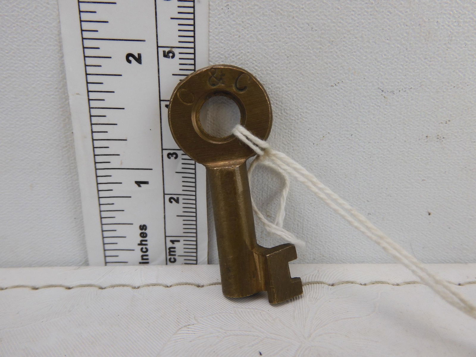 C&C brass switch key.  smaller that most switch keys. (1 of 3)