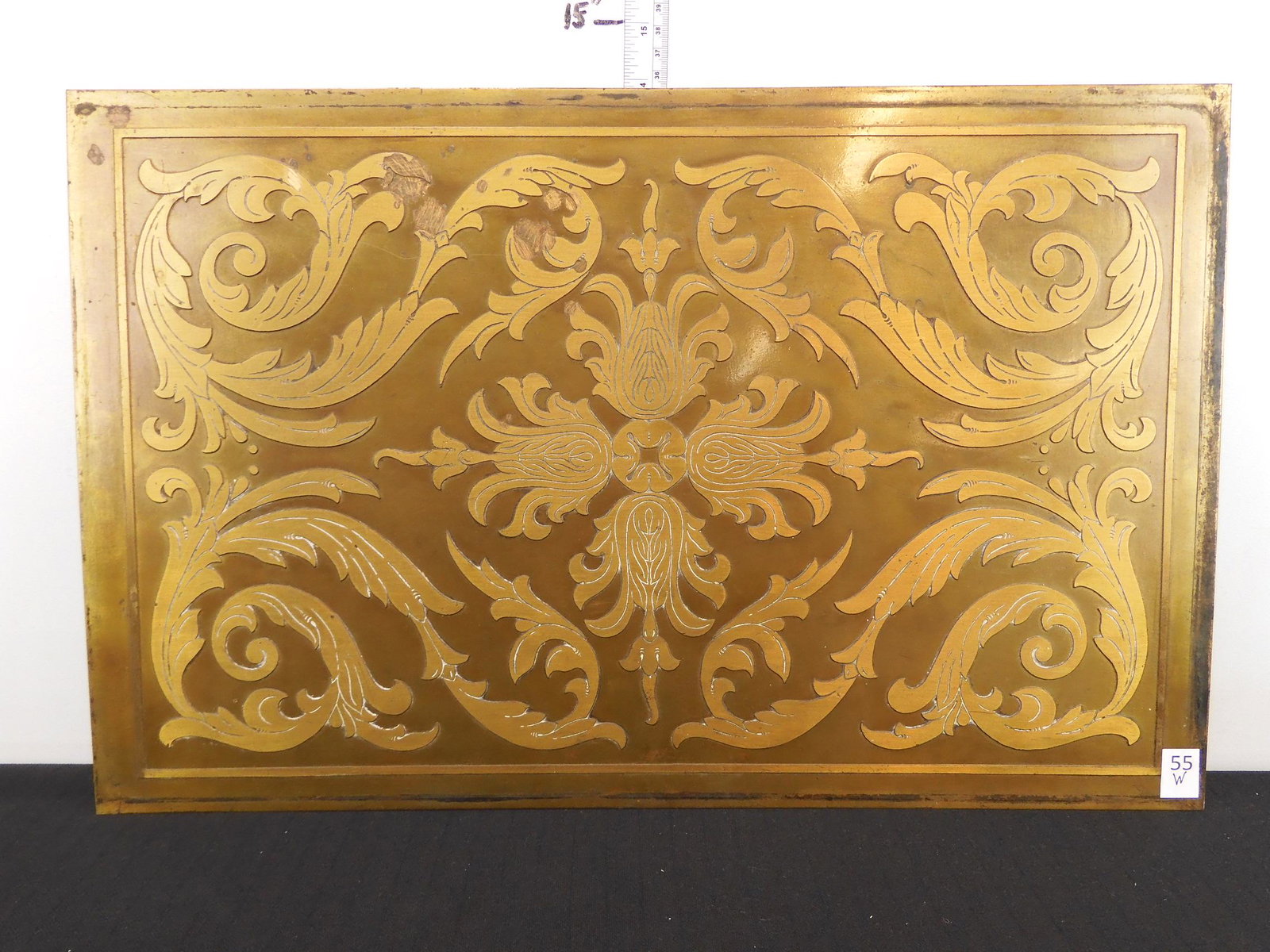beautiful brass engraved panel, 14" 22".It looks like: beautiful brass engraved panel, 14" 22".It looks like one shown on page 227 of the Lucius Beebe book on railroad private cars, MANSIONS ON RAILS. The top half of a PRR fireplace looks very much like t