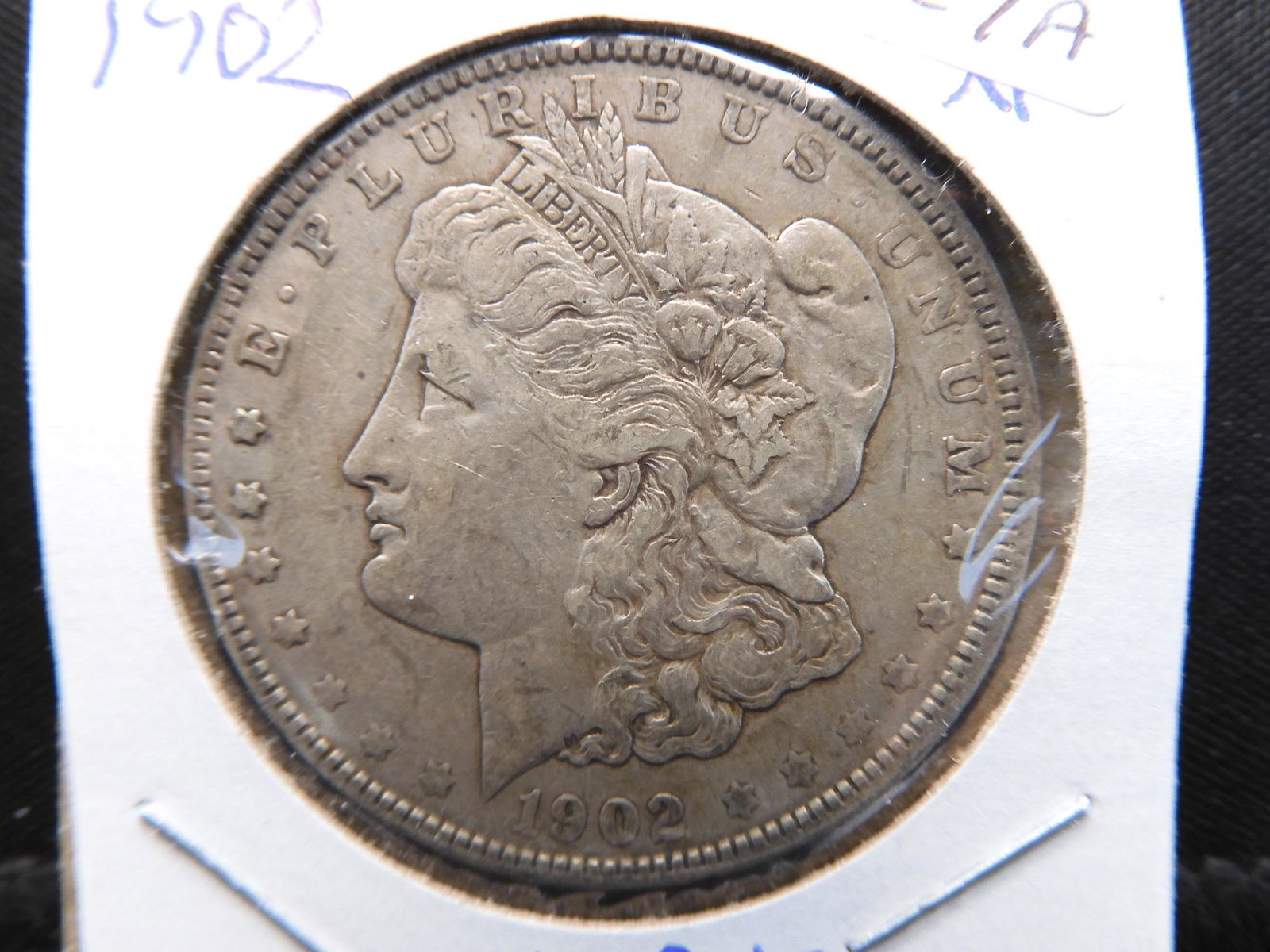 1902 Morgan Dollar.  Nice XF.  Very difficult (1 of 3)