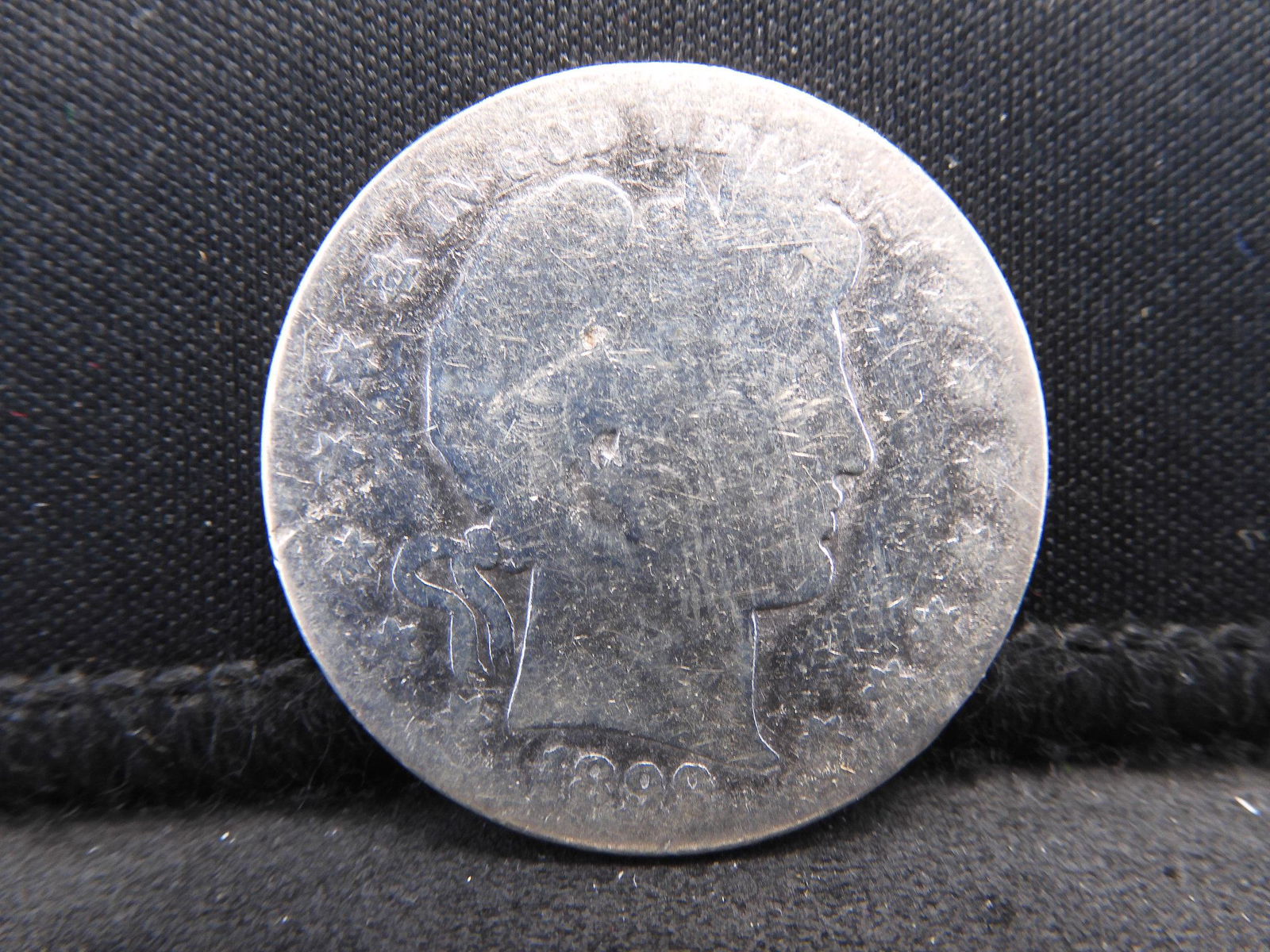 1899-O Semi-Key Date Barber Half Dollar. (1 of 2)
