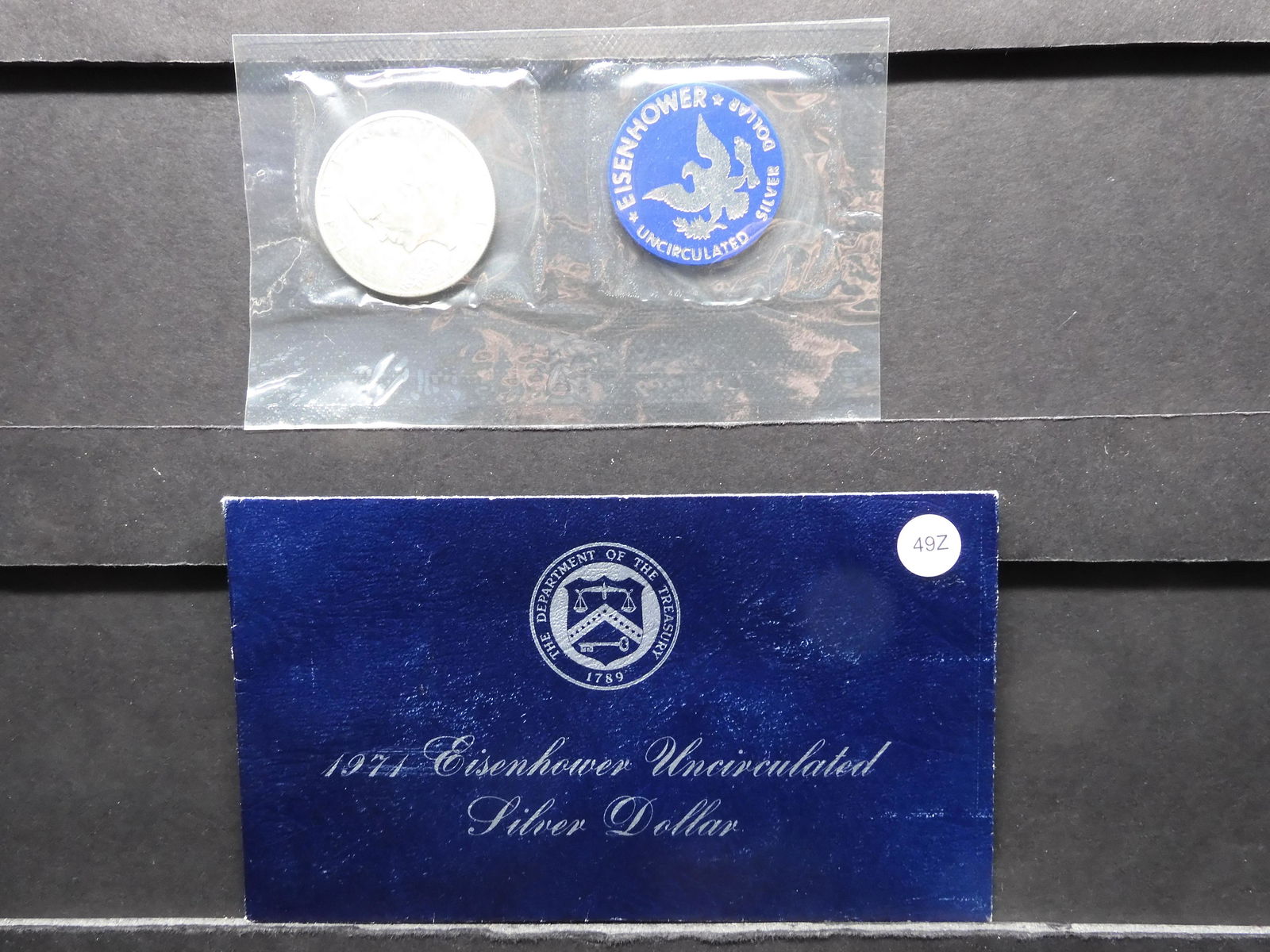 1971 Eisenhower Unc. 40% Silver Dollar in the Blue flat (1 of 3)