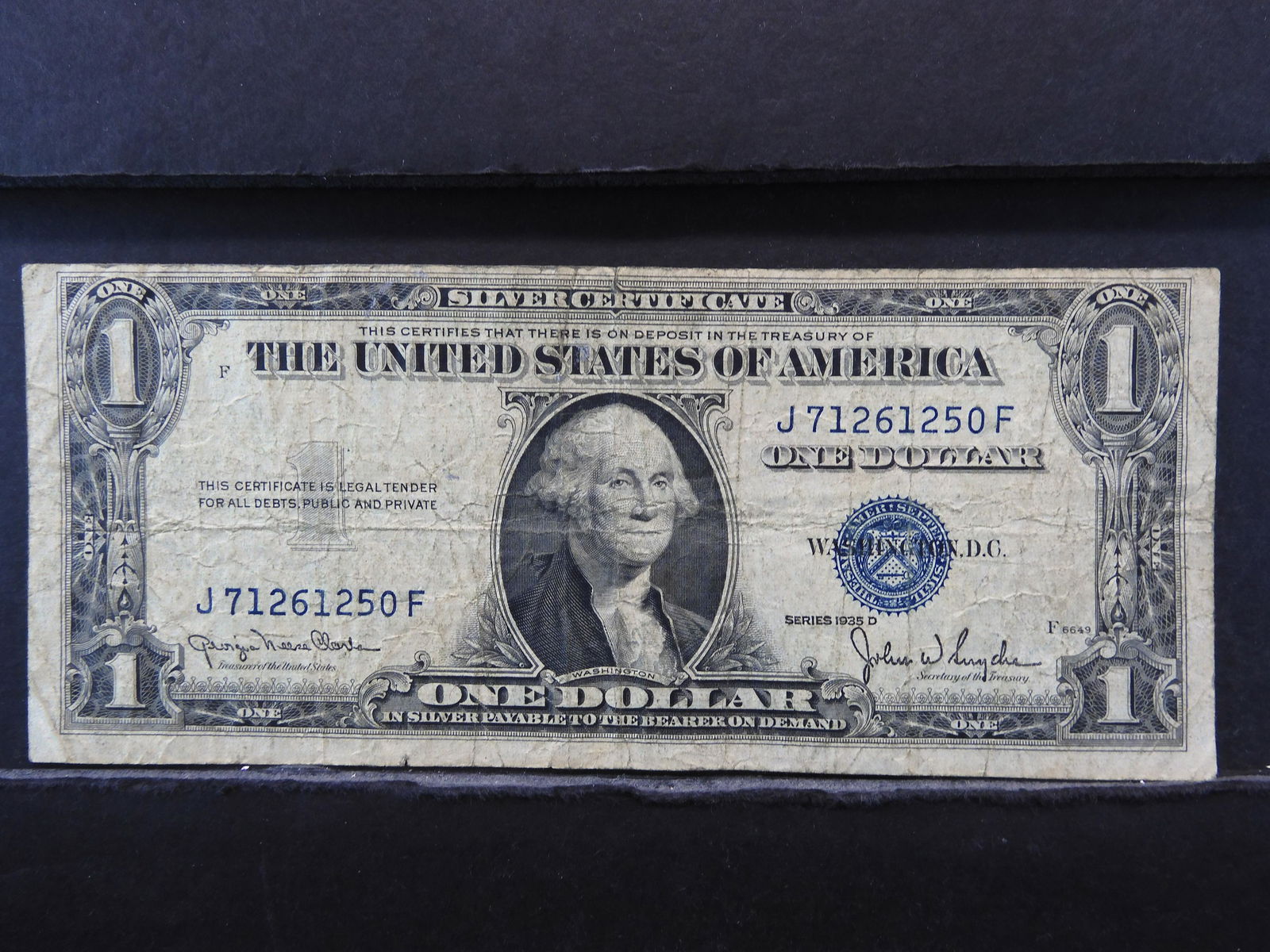 1935 D, (ERROR/VERTICAL DIE SHIFT) $1 DOLLAR SILVER (1 of 3)