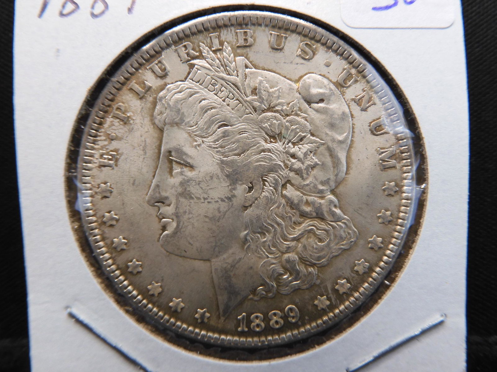1889 Morgan Dollar.  Uncirculated. (1 of 3)