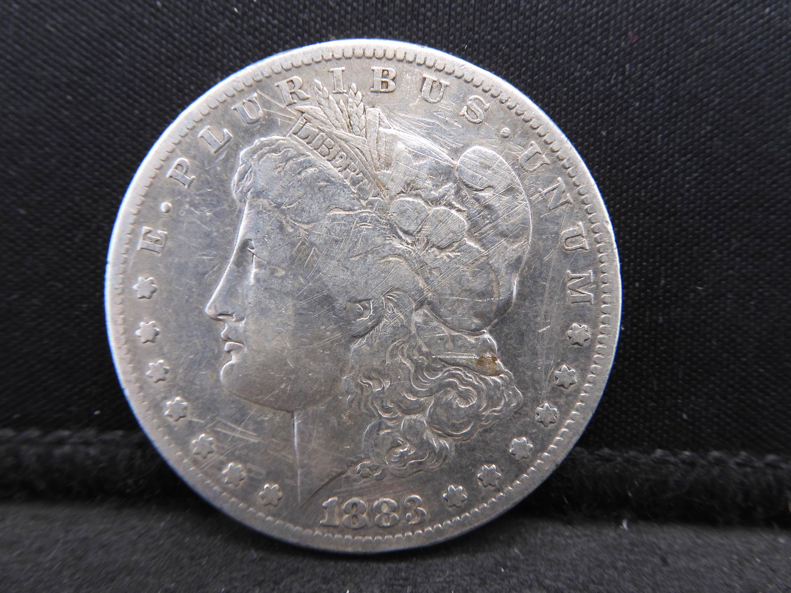 1883-S Semi-Key Date Morgan Silver Dollar. (1 of 2)