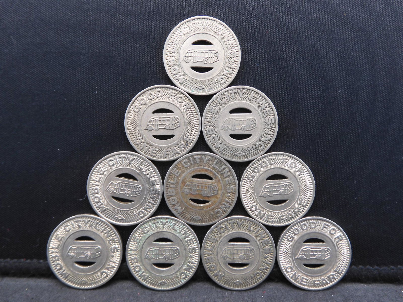 Group of 10 Transit Tokens. (1 of 2)