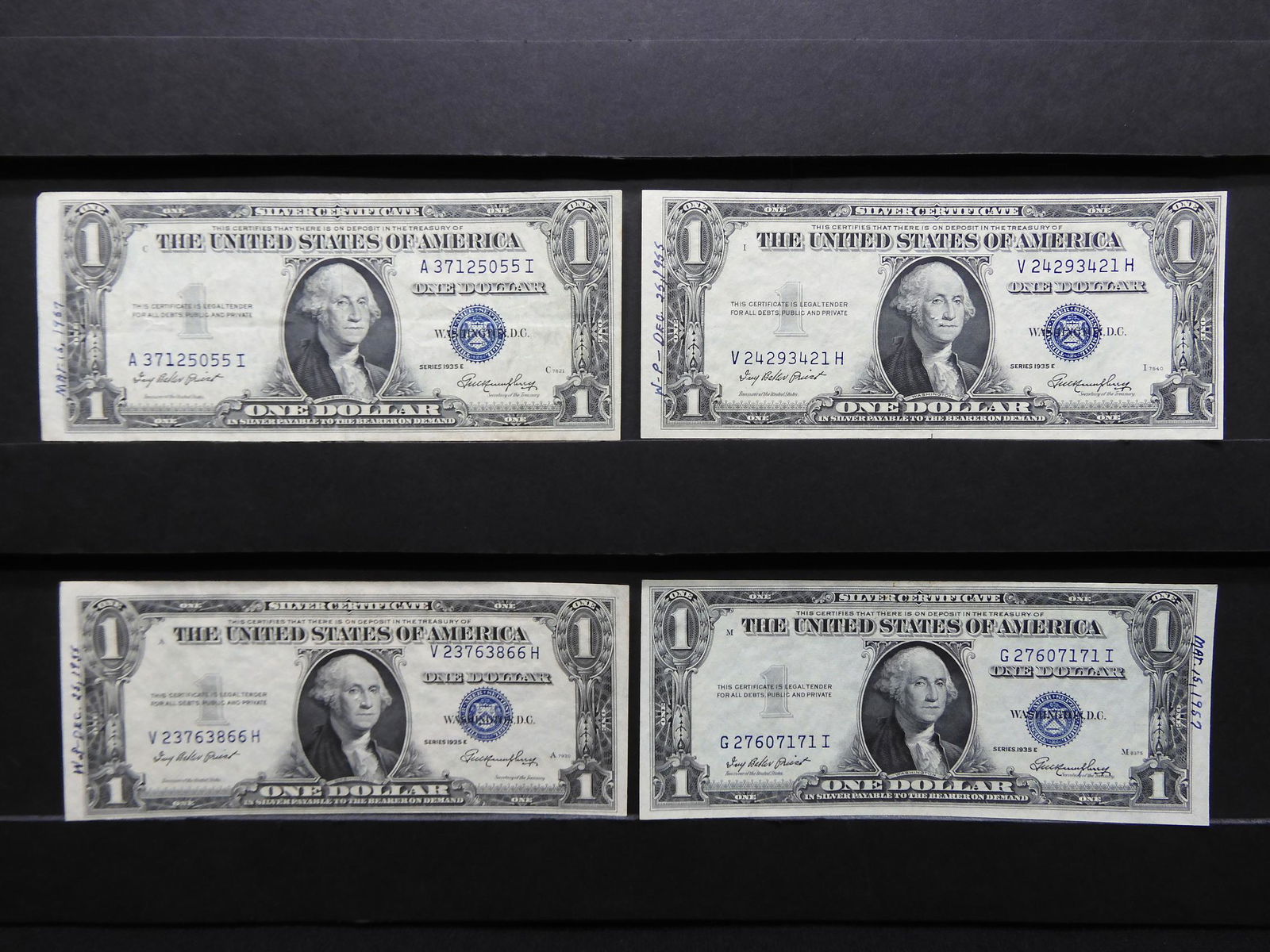 Four 1935-E $1 Blue Seal Silver Certificates. (1 of 6)