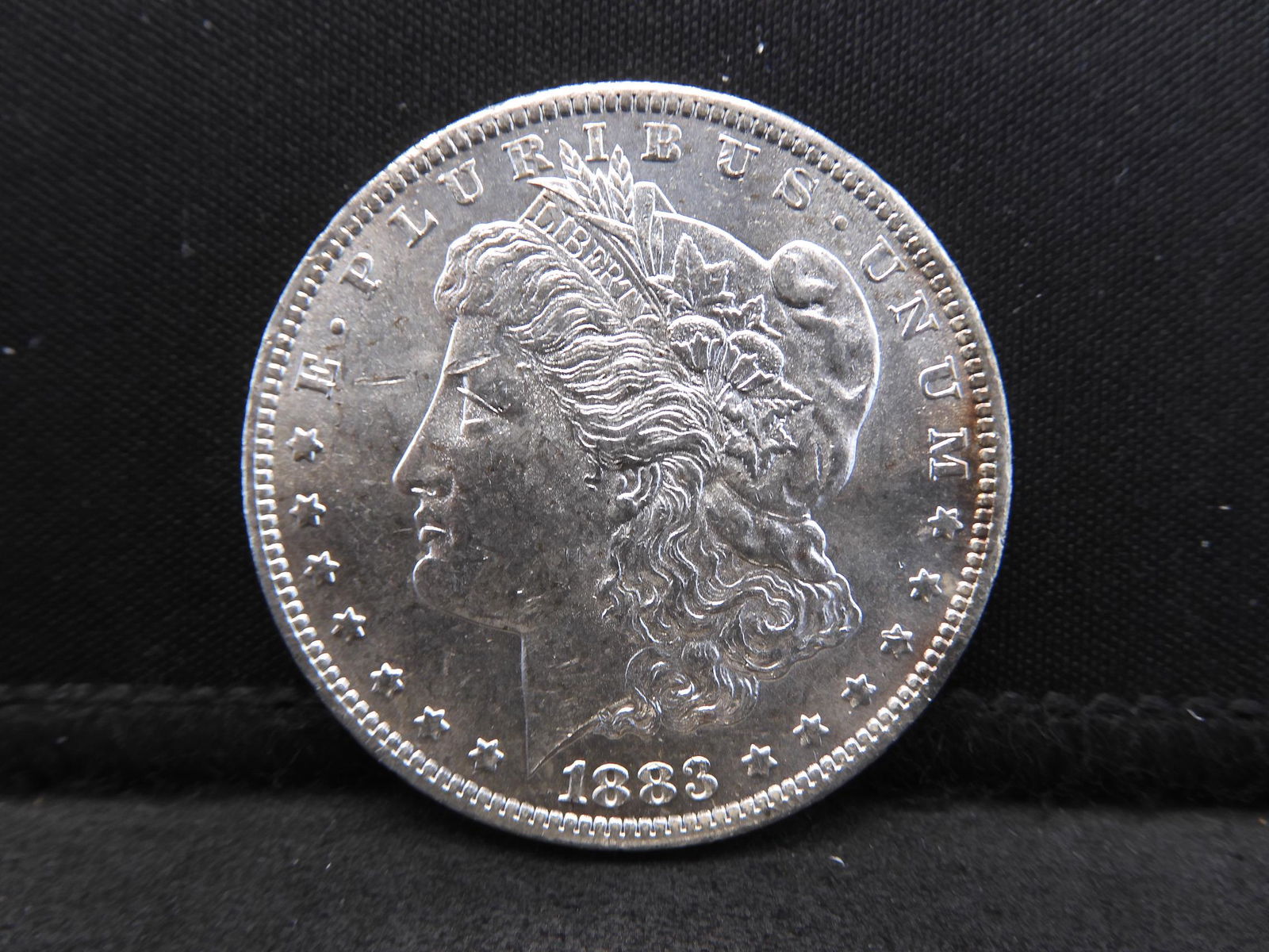 1883-O Morgan Silver Dollar - BU Cond (1 of 2)