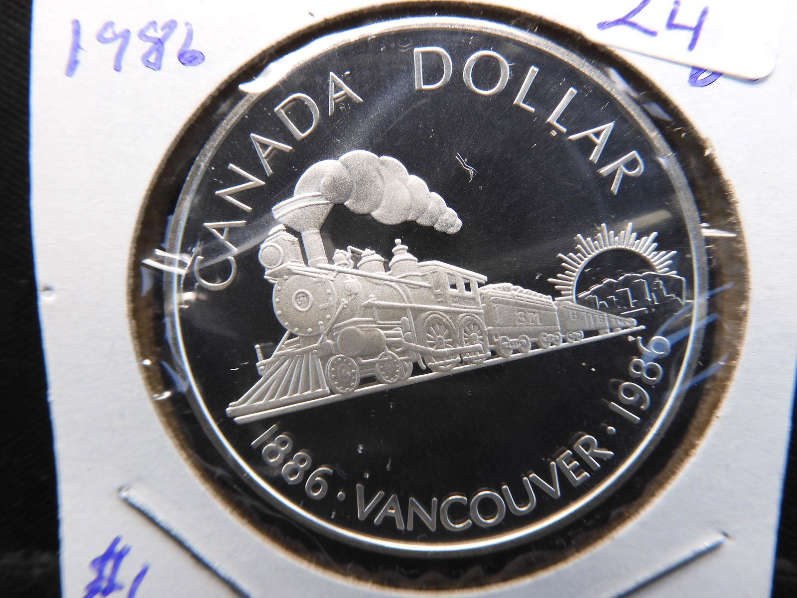 1986 Canada Vancouver Silver $1.  Proof Like BU. (1 of 3)