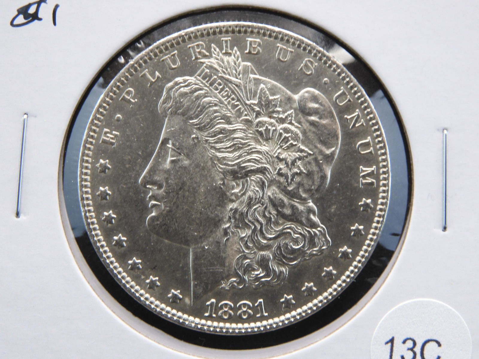 1881-O Morgan $1.  AU/UNC. (1 of 3)