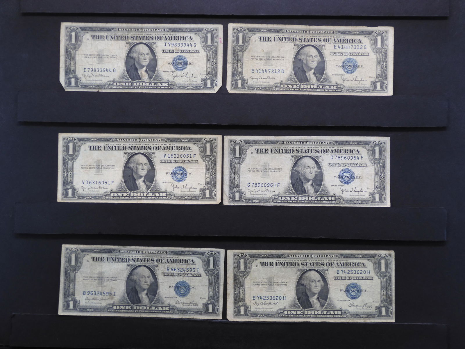 6 - $1 Silver Certificates.  All Dated 1935. (1 of 8)