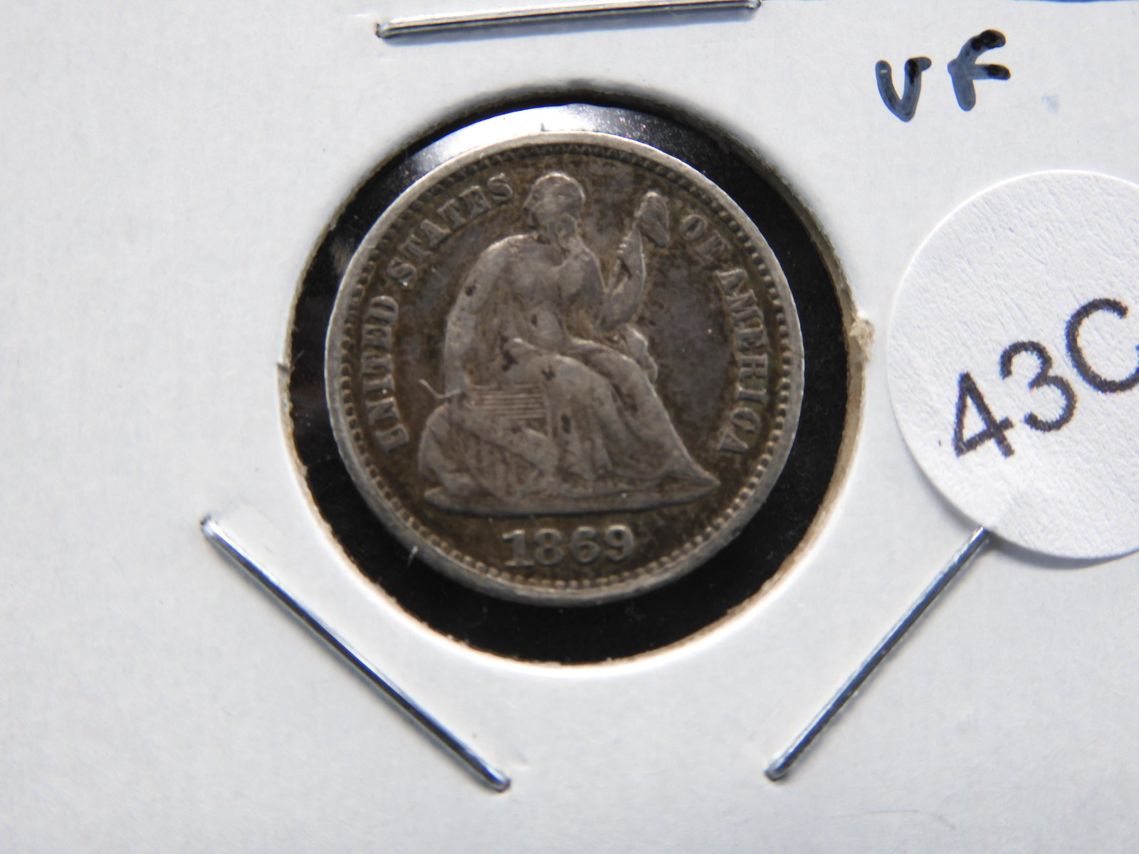 1869 Seated 1/2 Dime.  VF.  Scarce Date. (1 of 4)