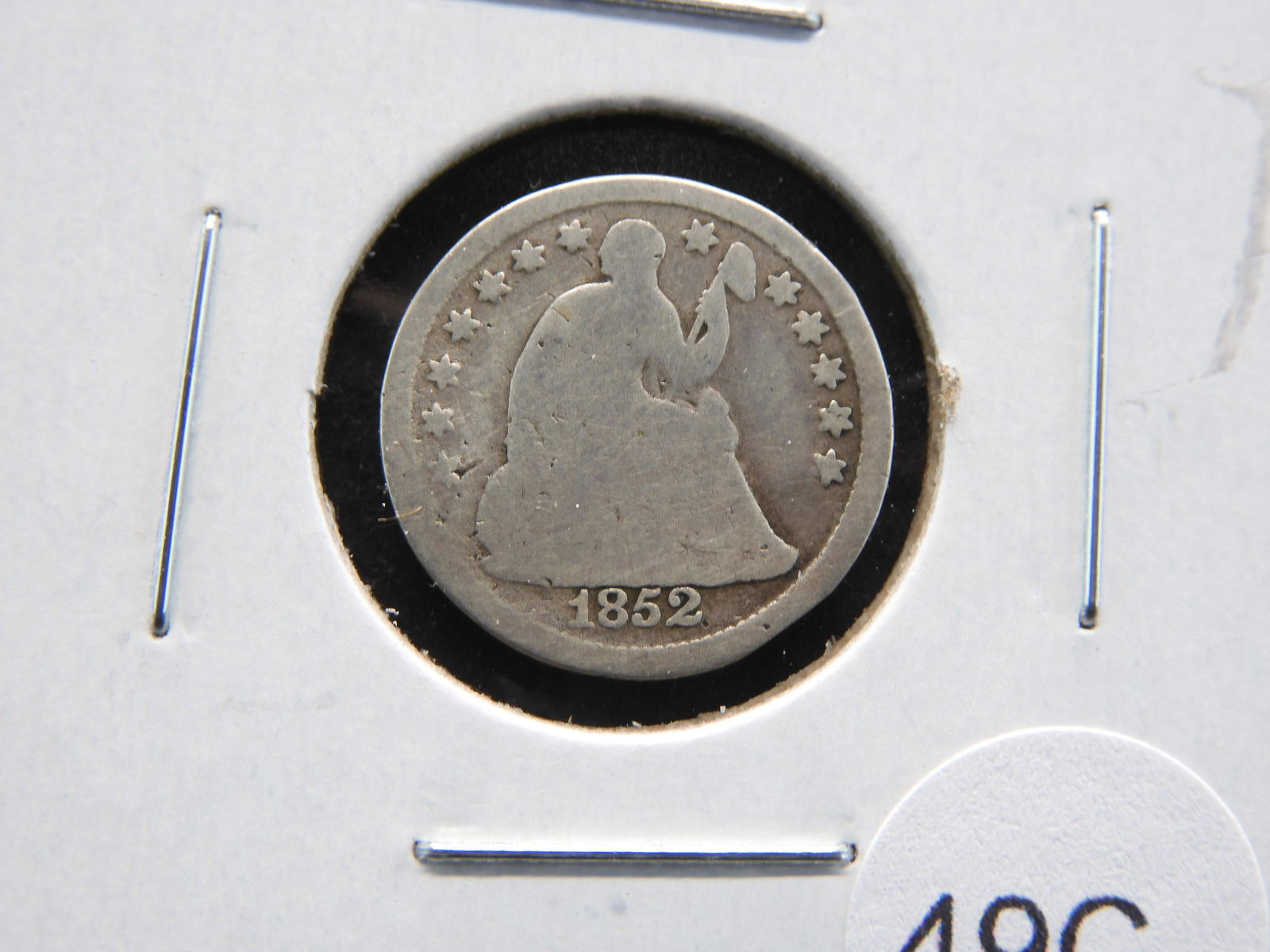 1852 Seated 1/2 Dime. (1 of 3)