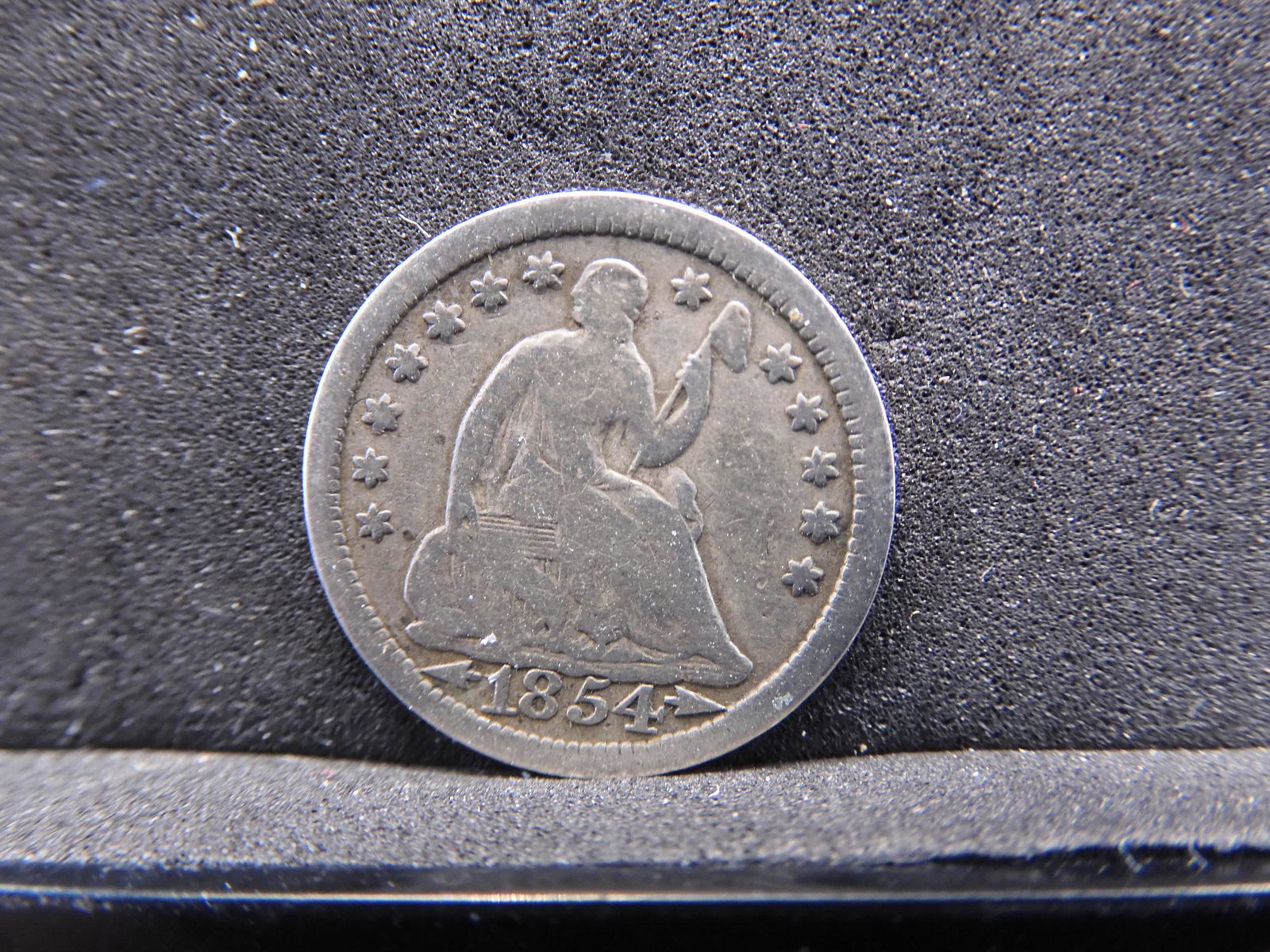 1854 Seated Liberty Half Dime. (1 of 2)