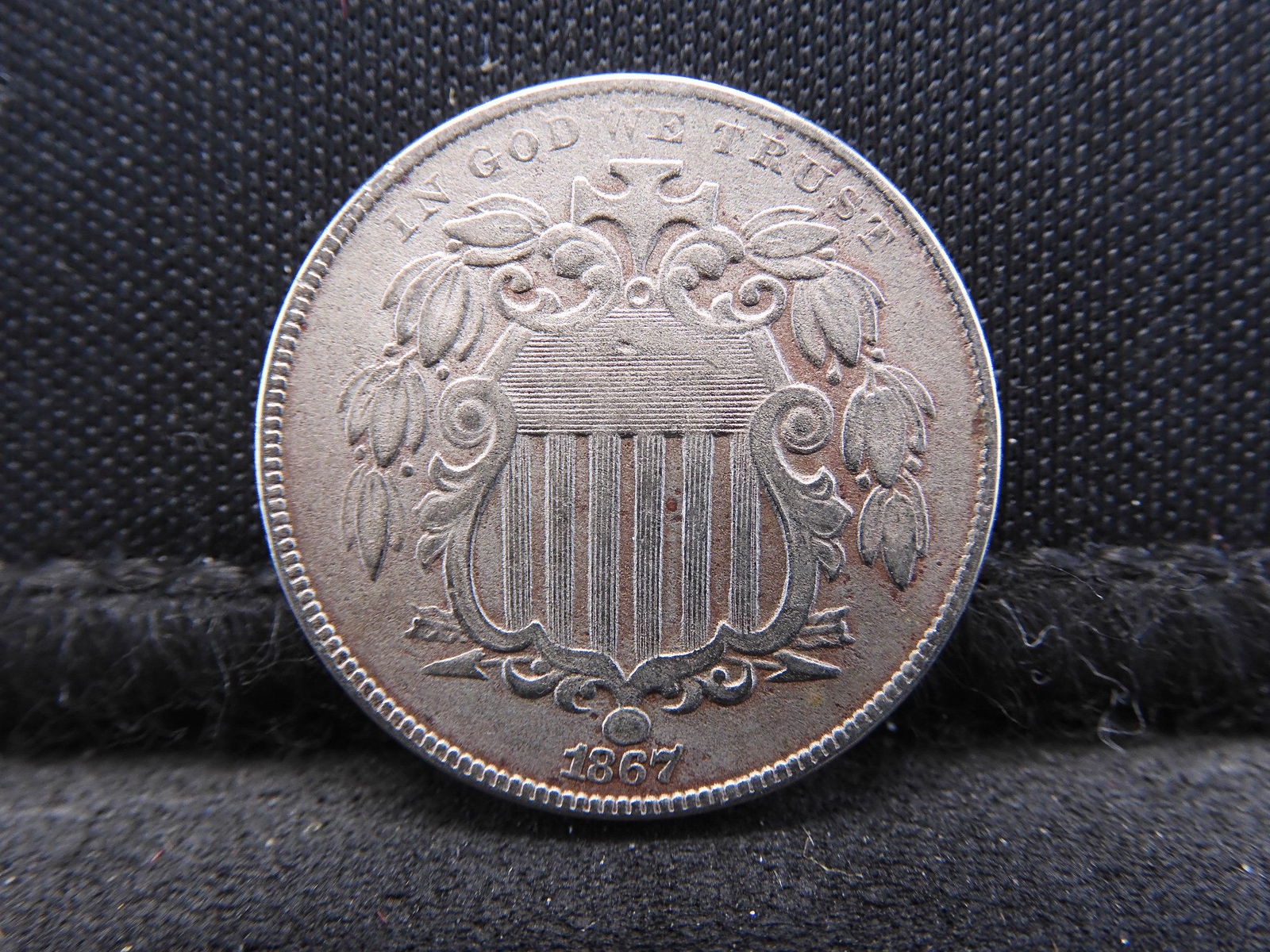 1867 With Rays Shield Nickel. (1 of 2)