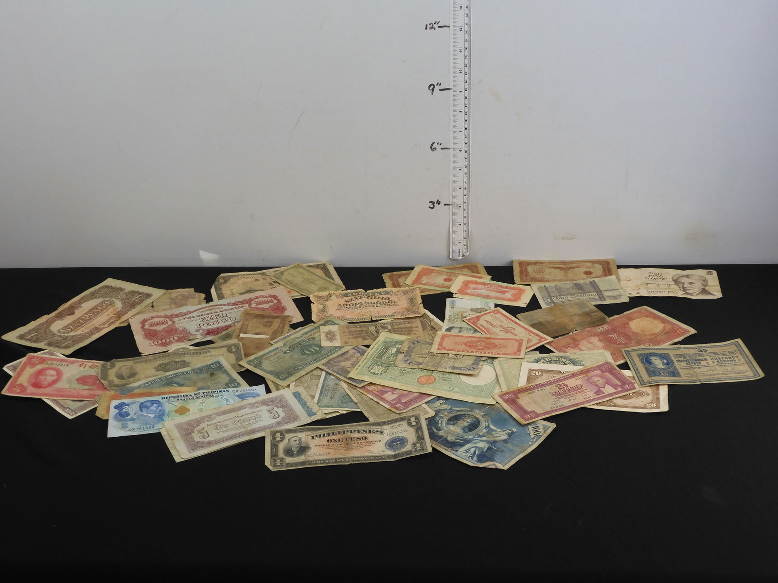 49 - Misc. Low Grade, Circulated Foreign Currency. (1 of 7)
