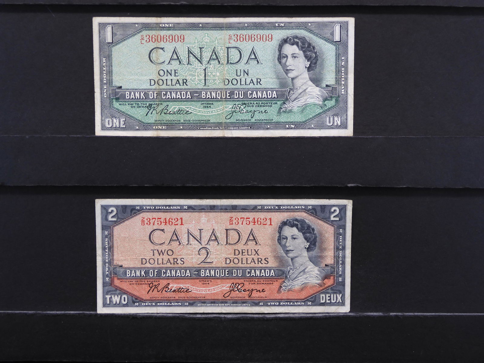 1954 Canada $1 & $2.  Circulated. (1 of 7)