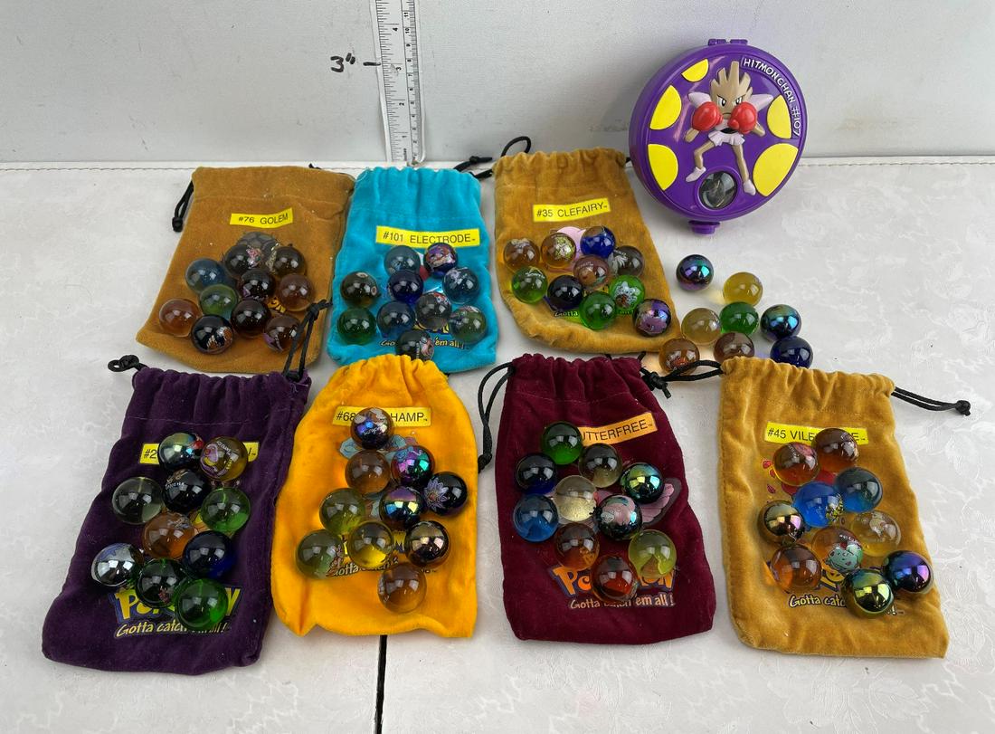 Lot of Pokemon Character Marbles in Bags and Plastic: Lot of Pokemon Character Marbles in Bags and Plastic Case - 86 Marbles