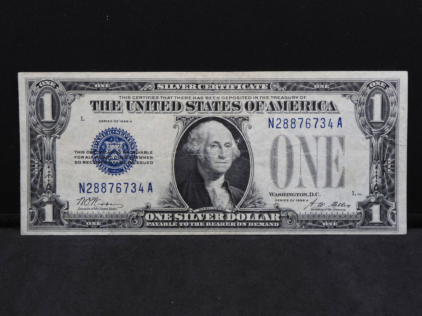 1928 A $1 Silver Certificate â€œFunny Back.â€  Nice (1 of 3)