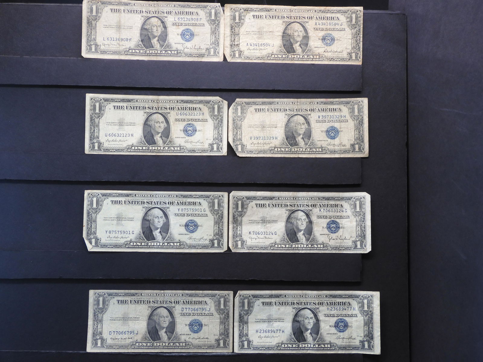 8 - 1935 $1 Silver Certificates.  Circulated. (1 of 7)