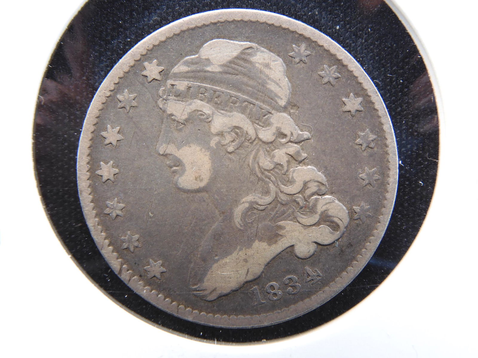 Mint Error: 1834 Capped Bust Quarter with 15% Rotated (1 of 3)