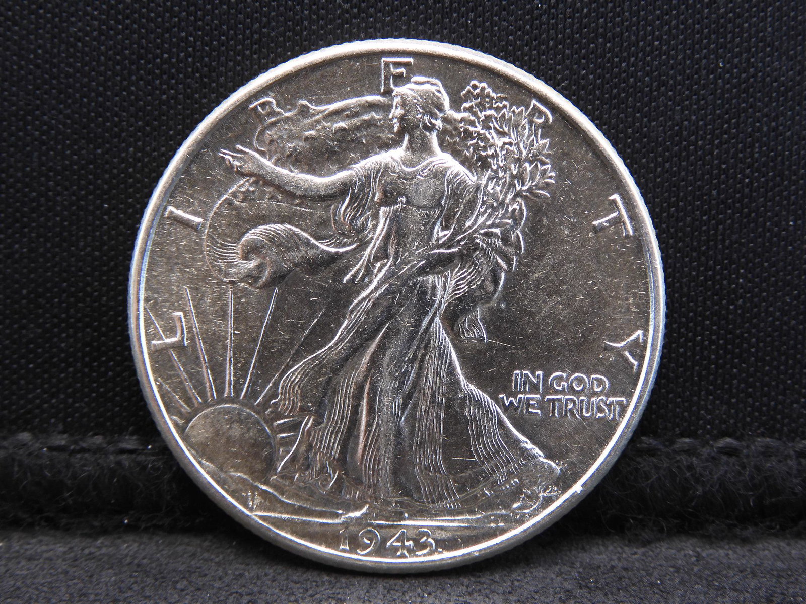 1943 Uncirculated Walking Liberty Half Dollar. (1 of 2)