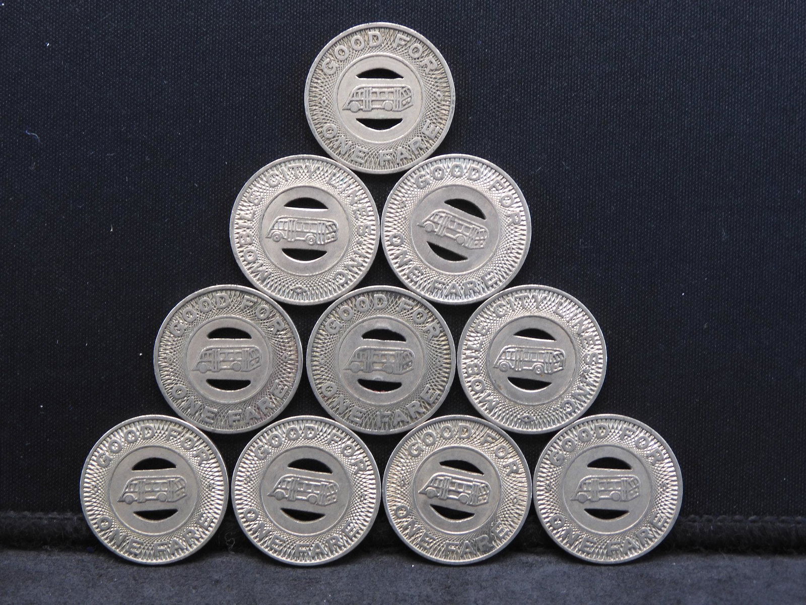 Group of 10 Transit Tokens. (1 of 2)