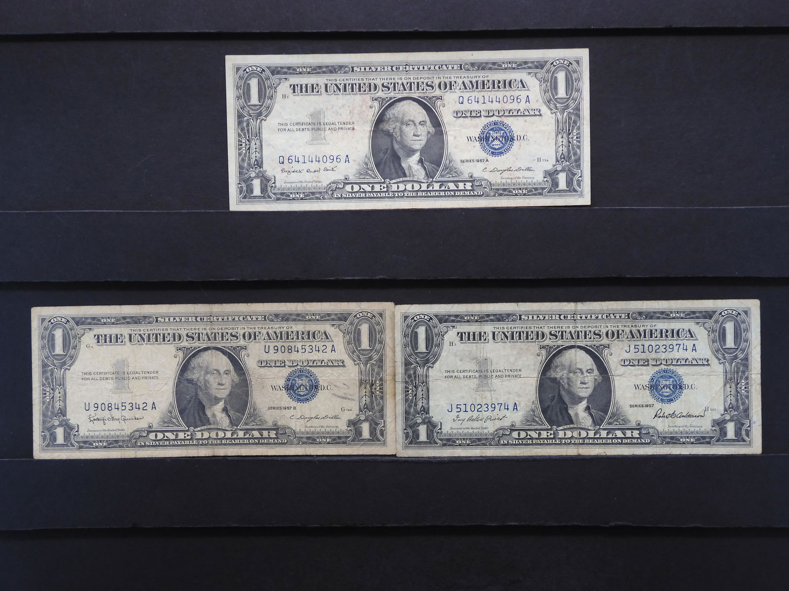 3 1957 $1 Silver Certificates (1 of 8)