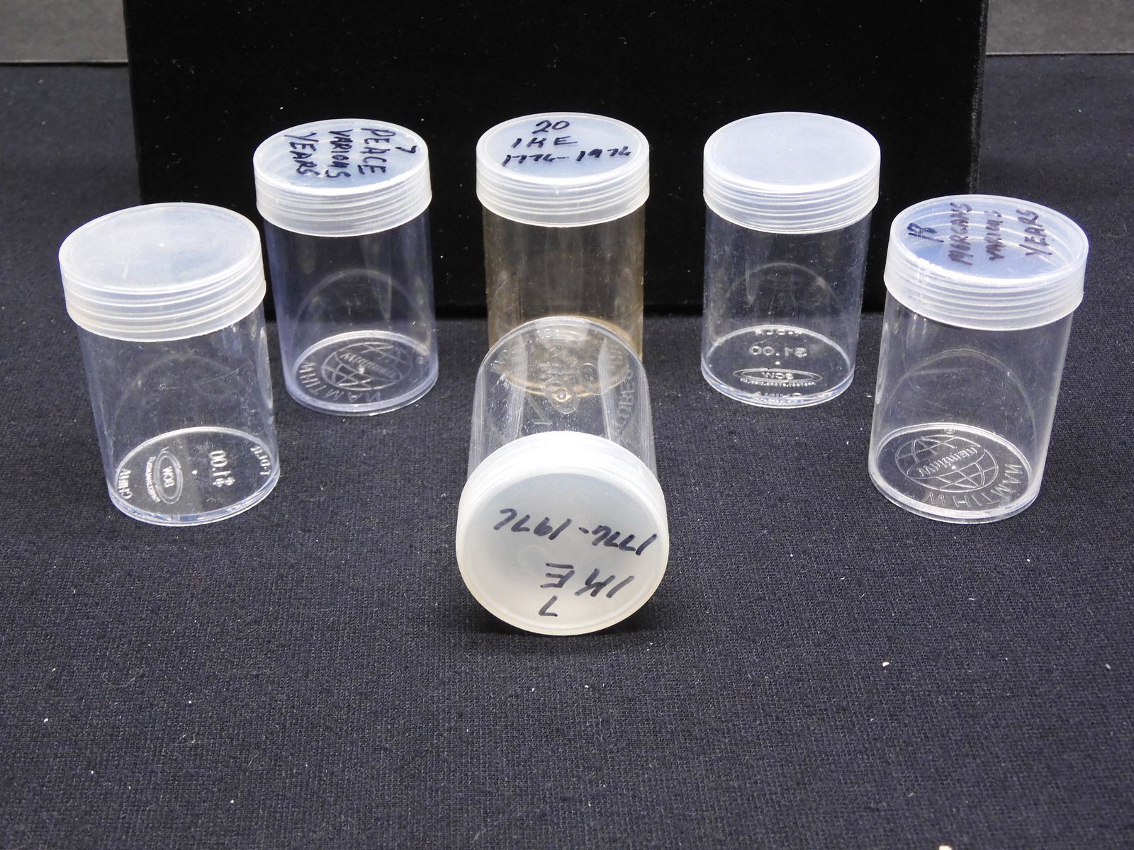 Six empty coin tubes (1 of 2)