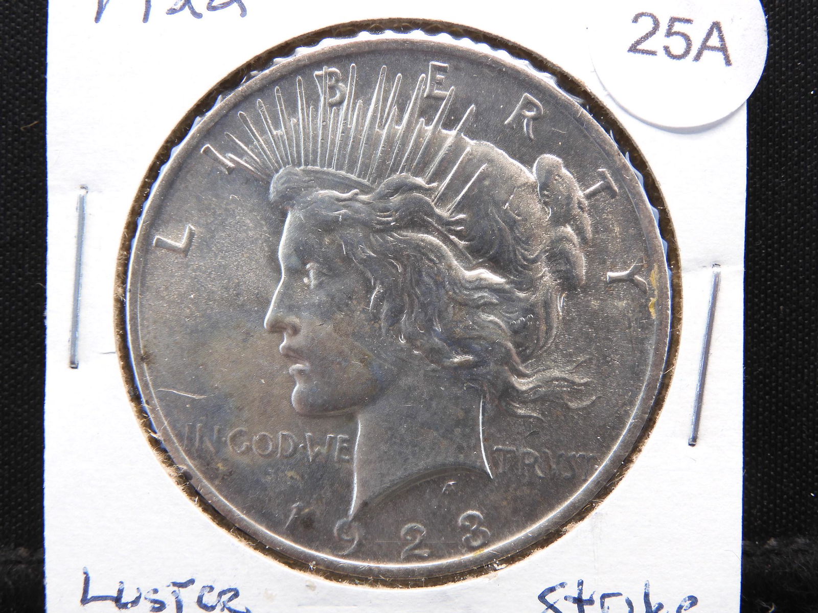 1923 Peace Dollar.  Uncirculated with few marks. (1 of 3)