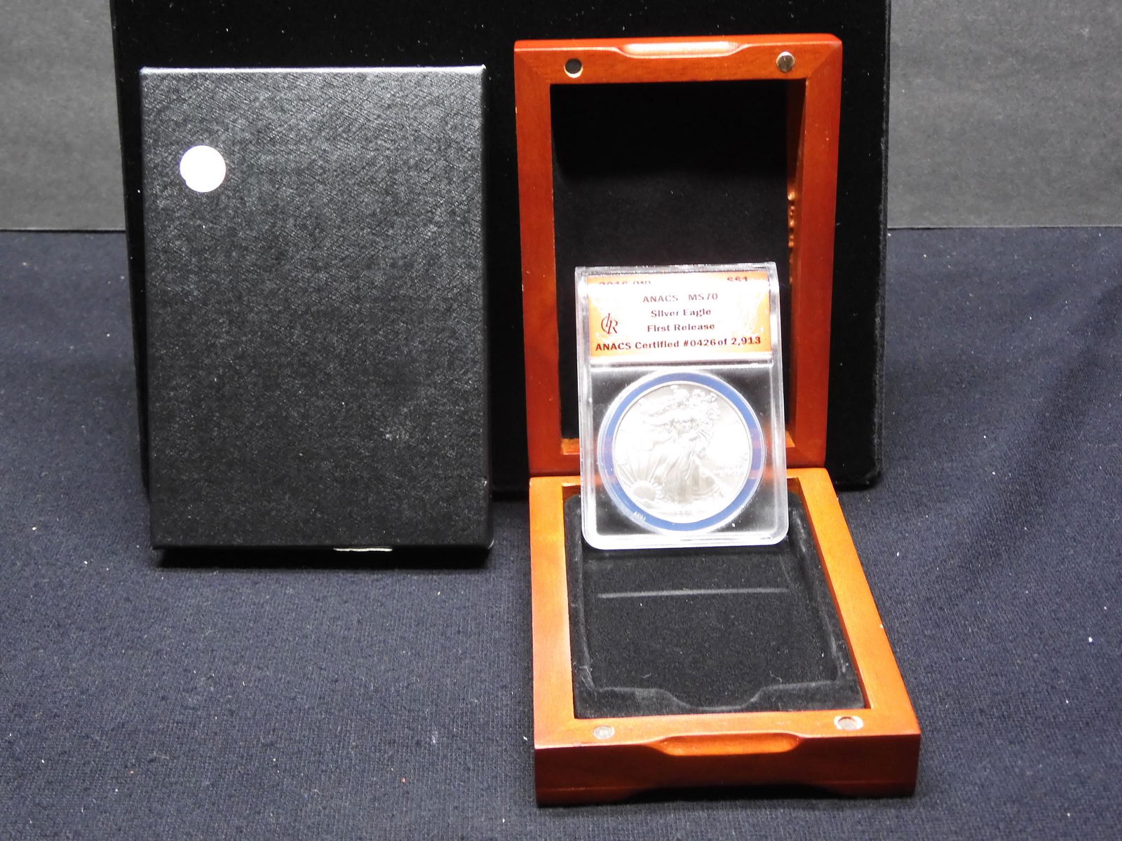 2016 (W) American Silver Eagle.  Slabbed by ANACS (One (1 of 7)